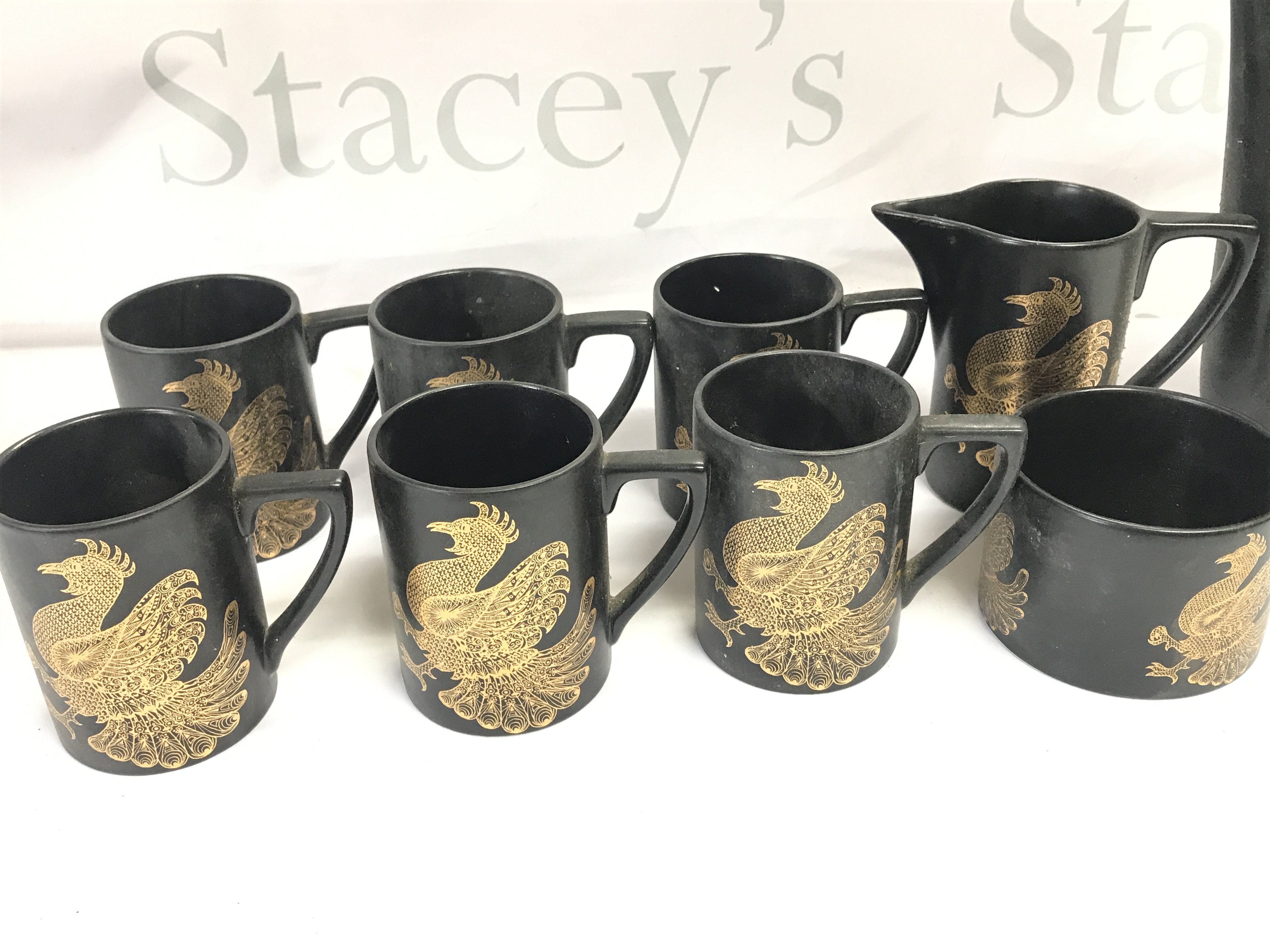 A Phoenix coffee set by John Cuffley. Postage D- NO RESERVE