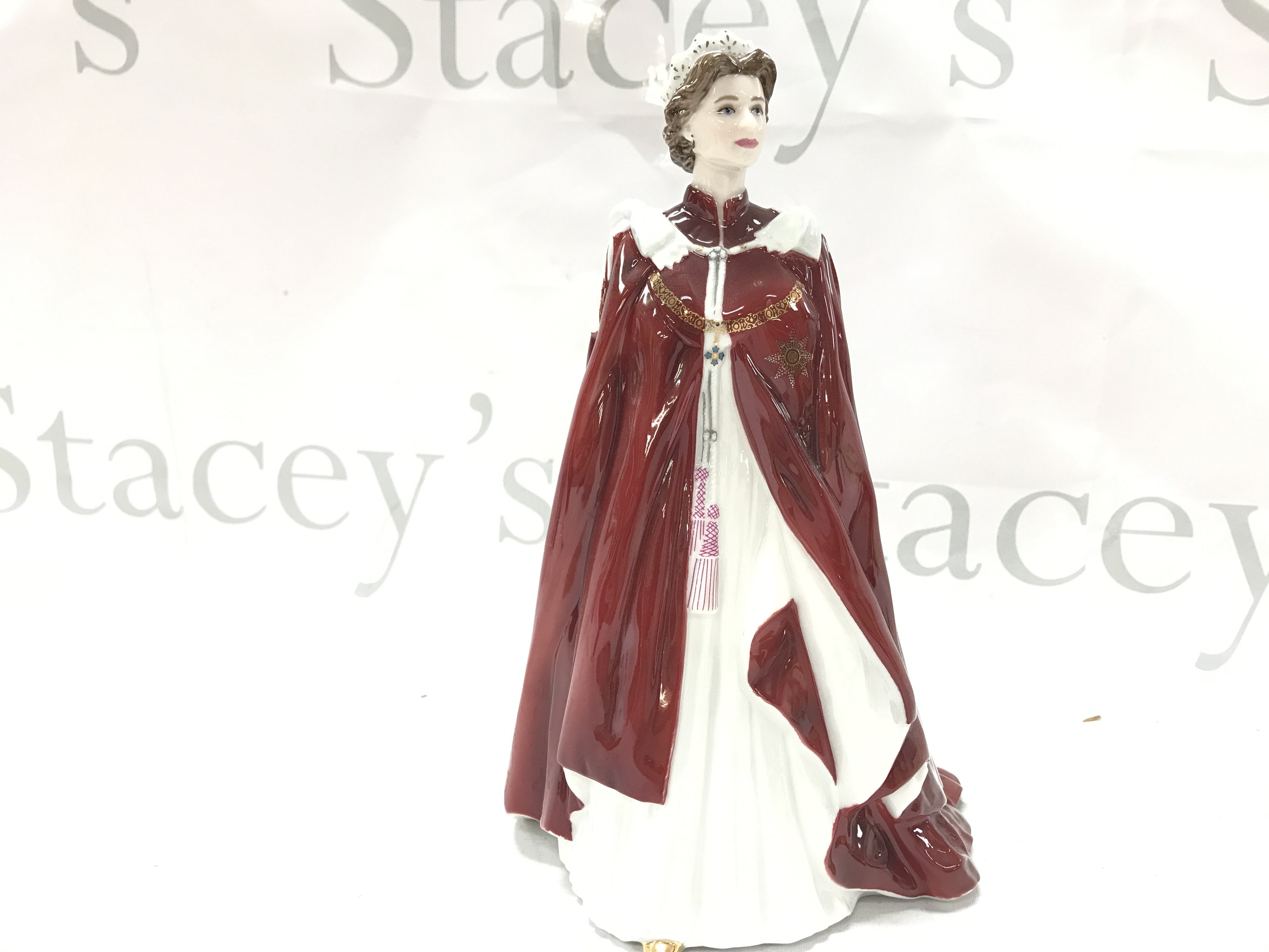 A collection of coloured glass including red, blue and Green cups, late 19th century pewter German pair of vases , Royal Horticultural Chelsea flower show porcelain plates, cut glass brandy decanter, Royal Worcester Queen figure. This lot cannot be posted- NO RESERVE