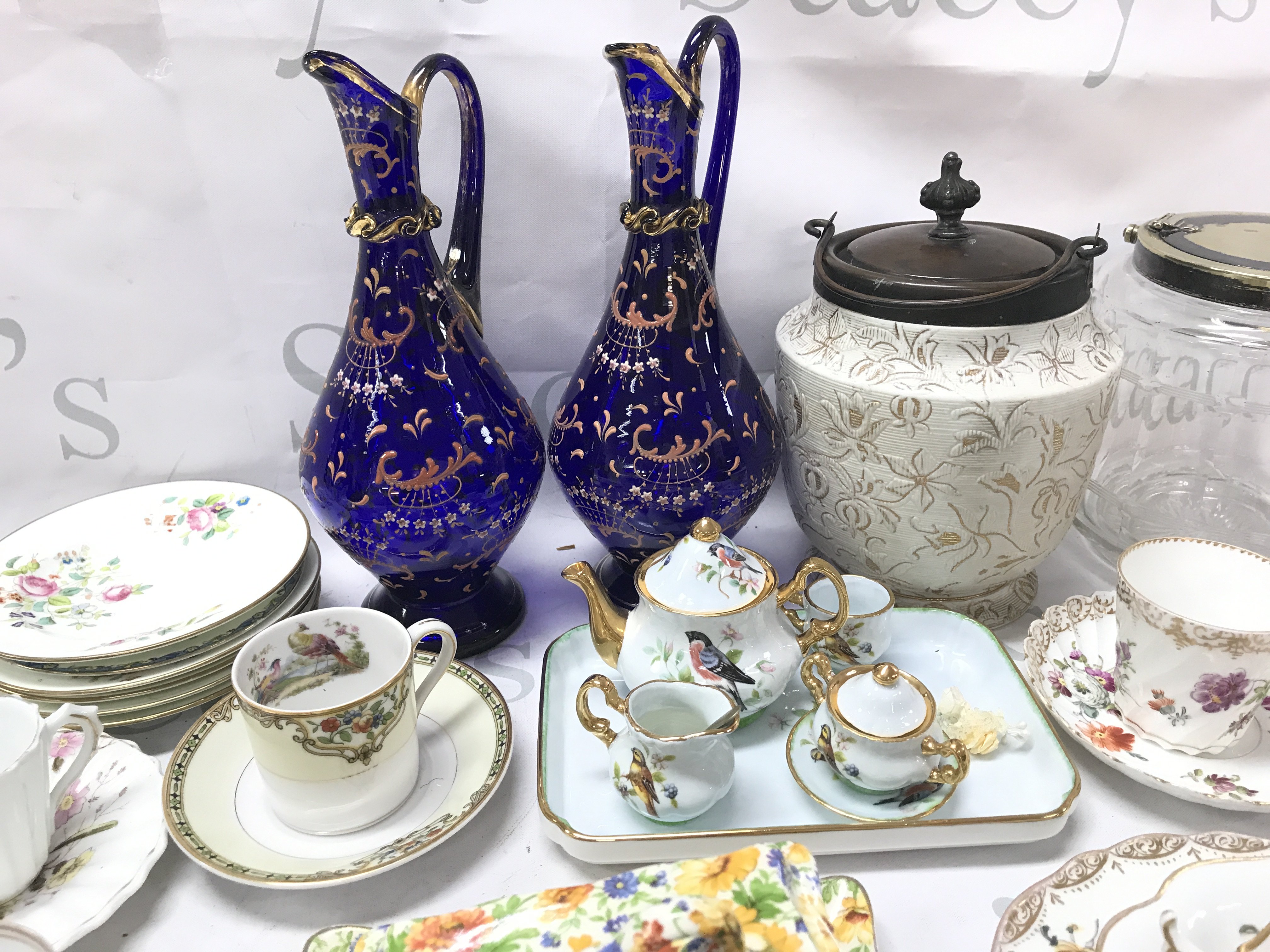A collection of ceramics including Meissen second condition plate, cup and saucer, 19th century Wedgewood plate , cup and saucer, Damask biscuit barrel , blue glass Victorian enamel decorated jugs, James Kent marigold. This lot cannot be posted.- NO RESERVE