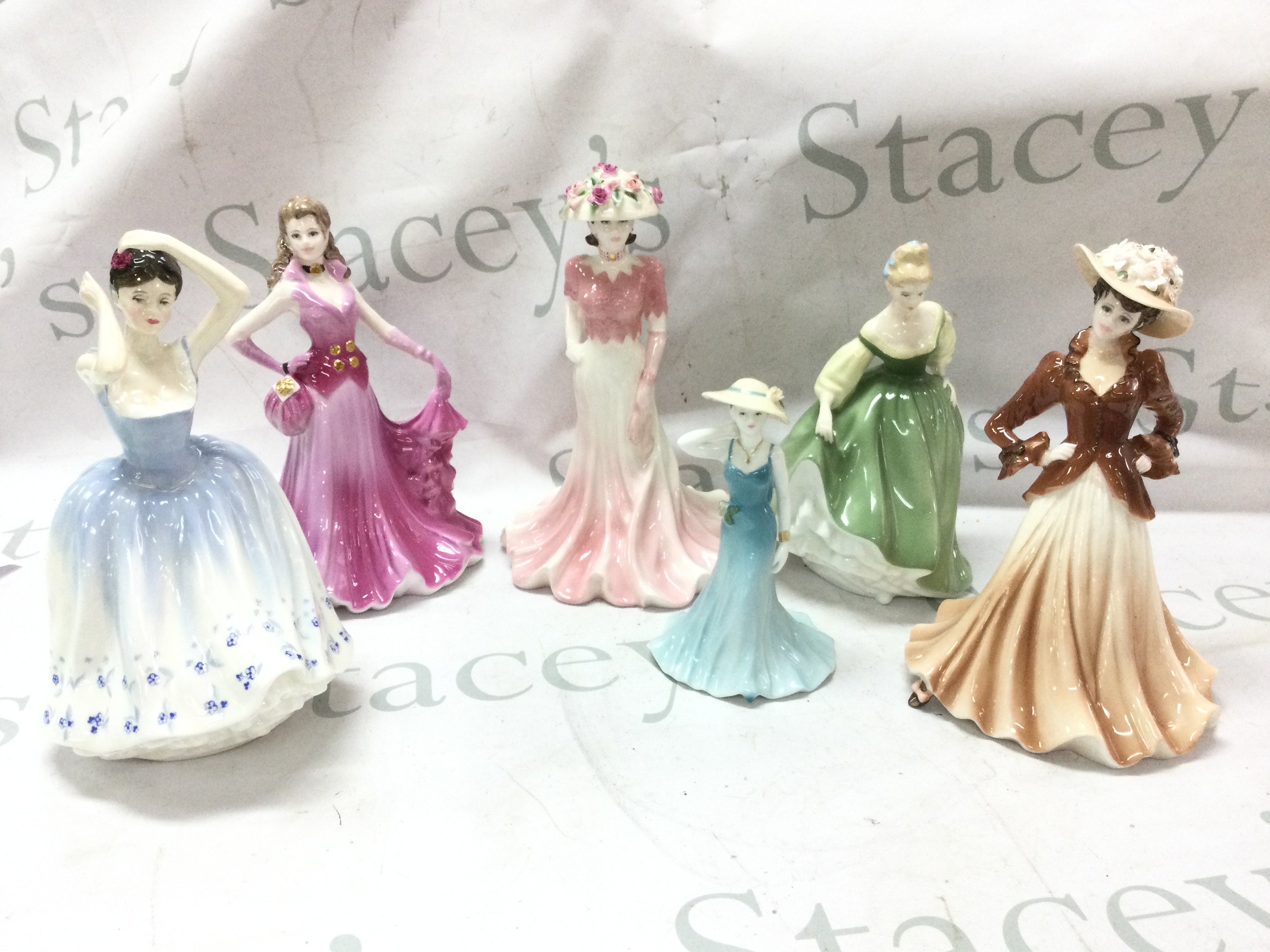 Royal Doulton and Coalport porcelain figures including Ladies of Fashion Liz, Debutante Rosalind, Shelia HN2742. This lot cannot be posted