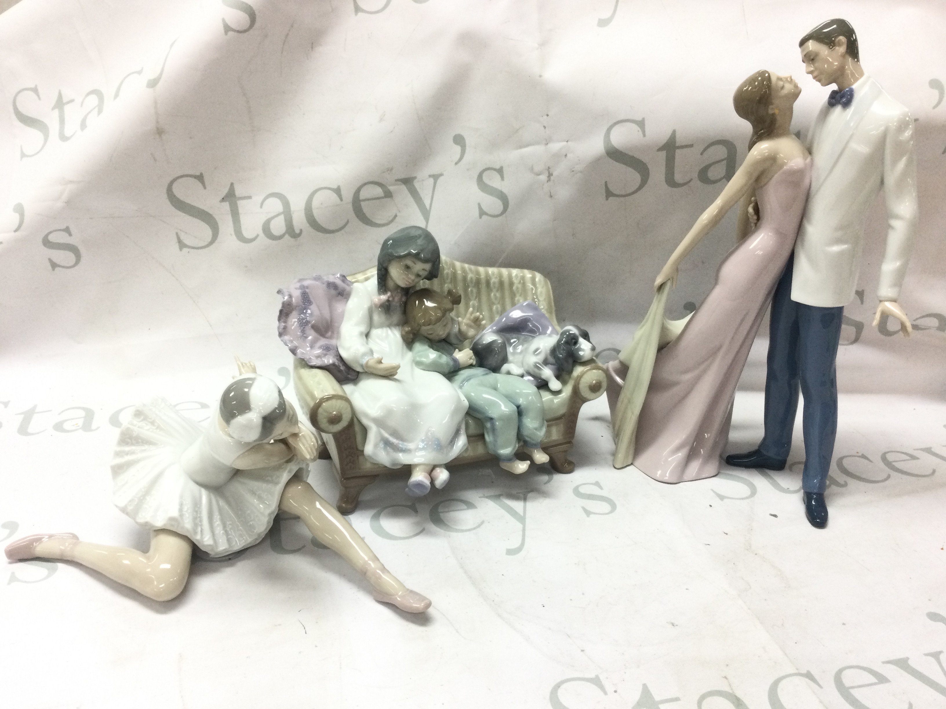 Three Lladro porcelain figures, Balerina, Big sister , Happy Anniversary . No obvious damage or restoration (book needs re gluing). This lot cannot be posted