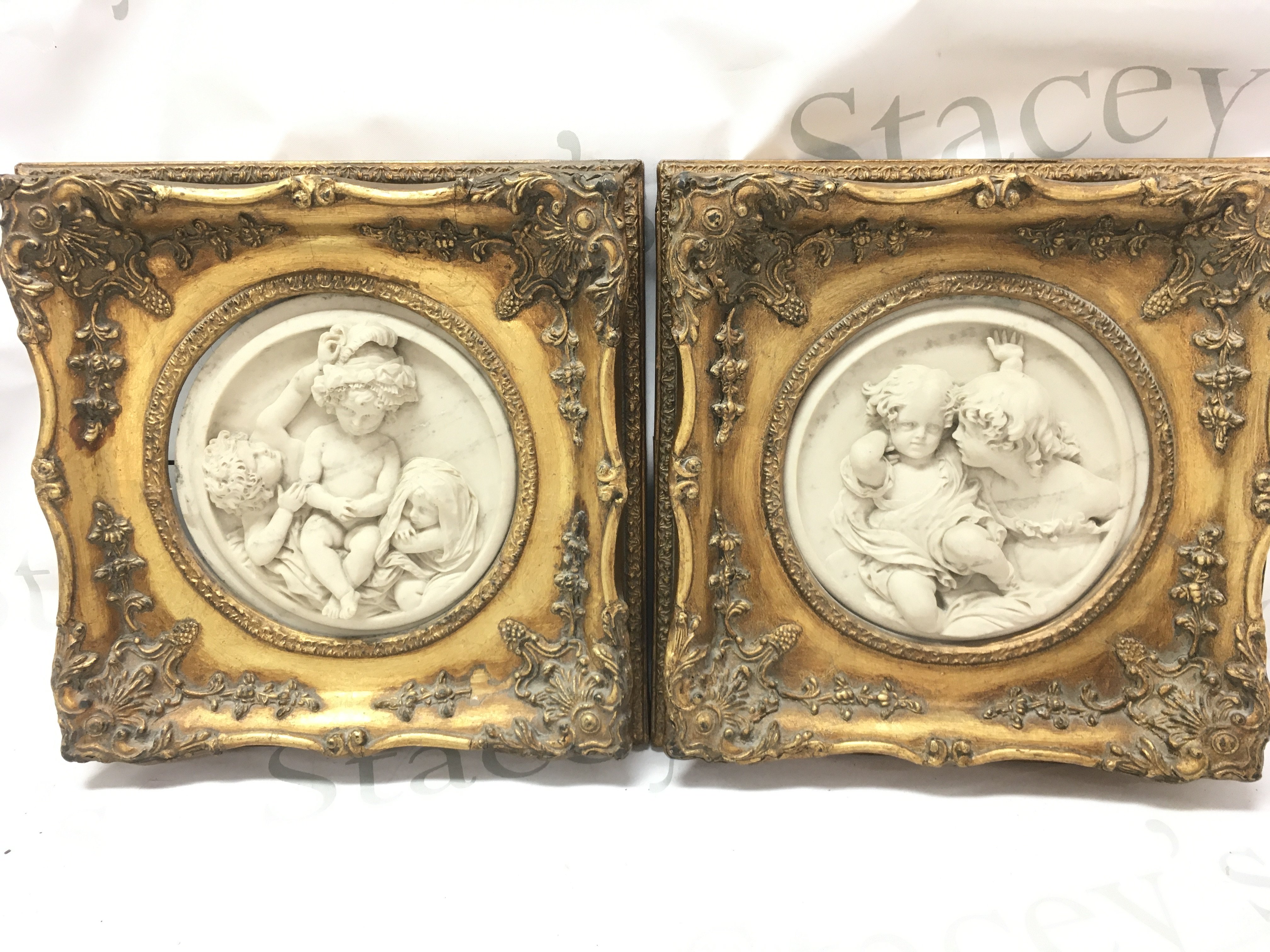 Two three dimensional composition marble plaques, 30x30cm. This lot cannot be posted