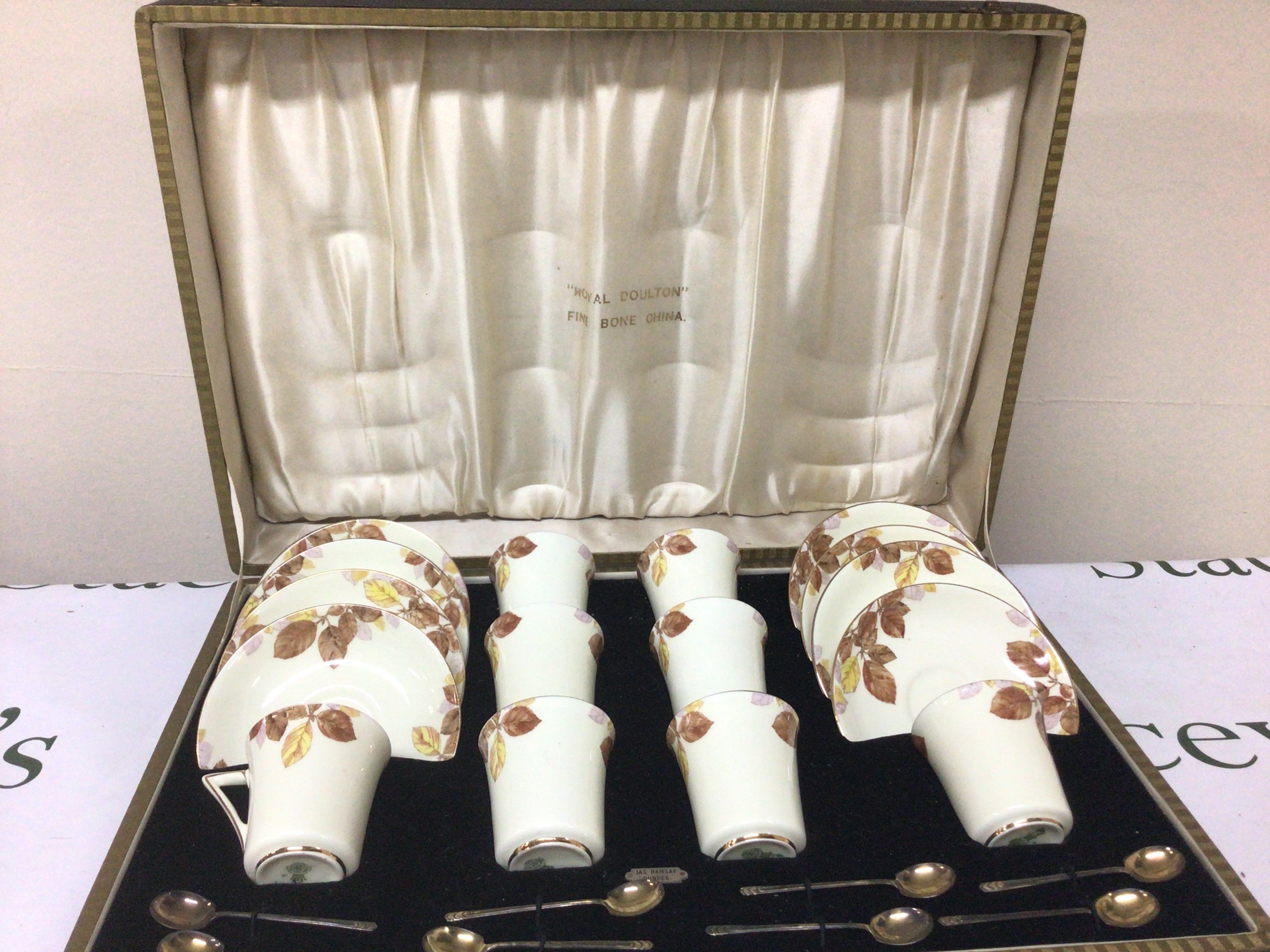 A quality Royal Doulton fine bone china tea set in a fitted case eight place setting no obvious damage the case with a set of eight silver tea spoons.