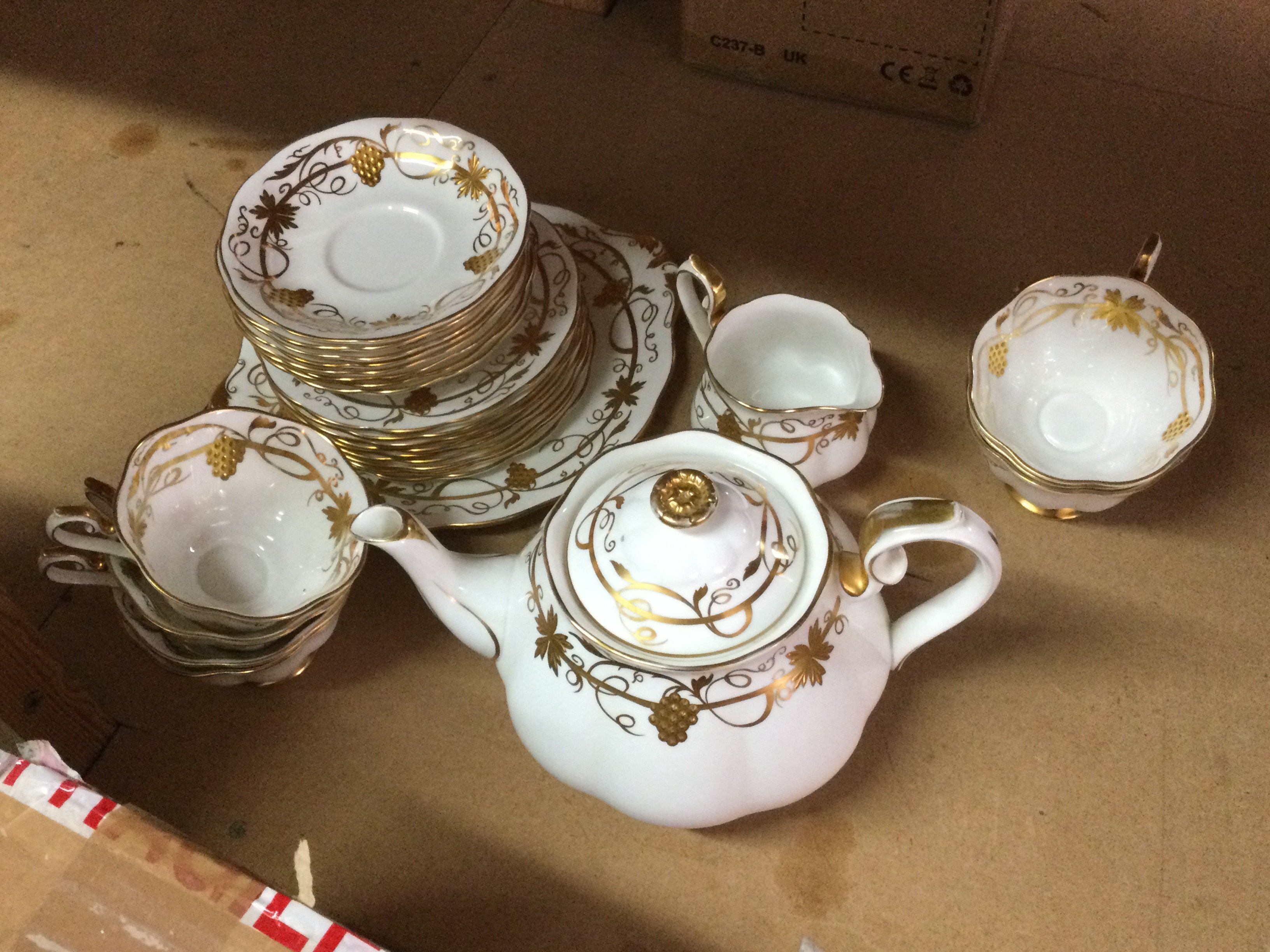 A royal Albert gold on white bone china tea set. This lot cannot be posted