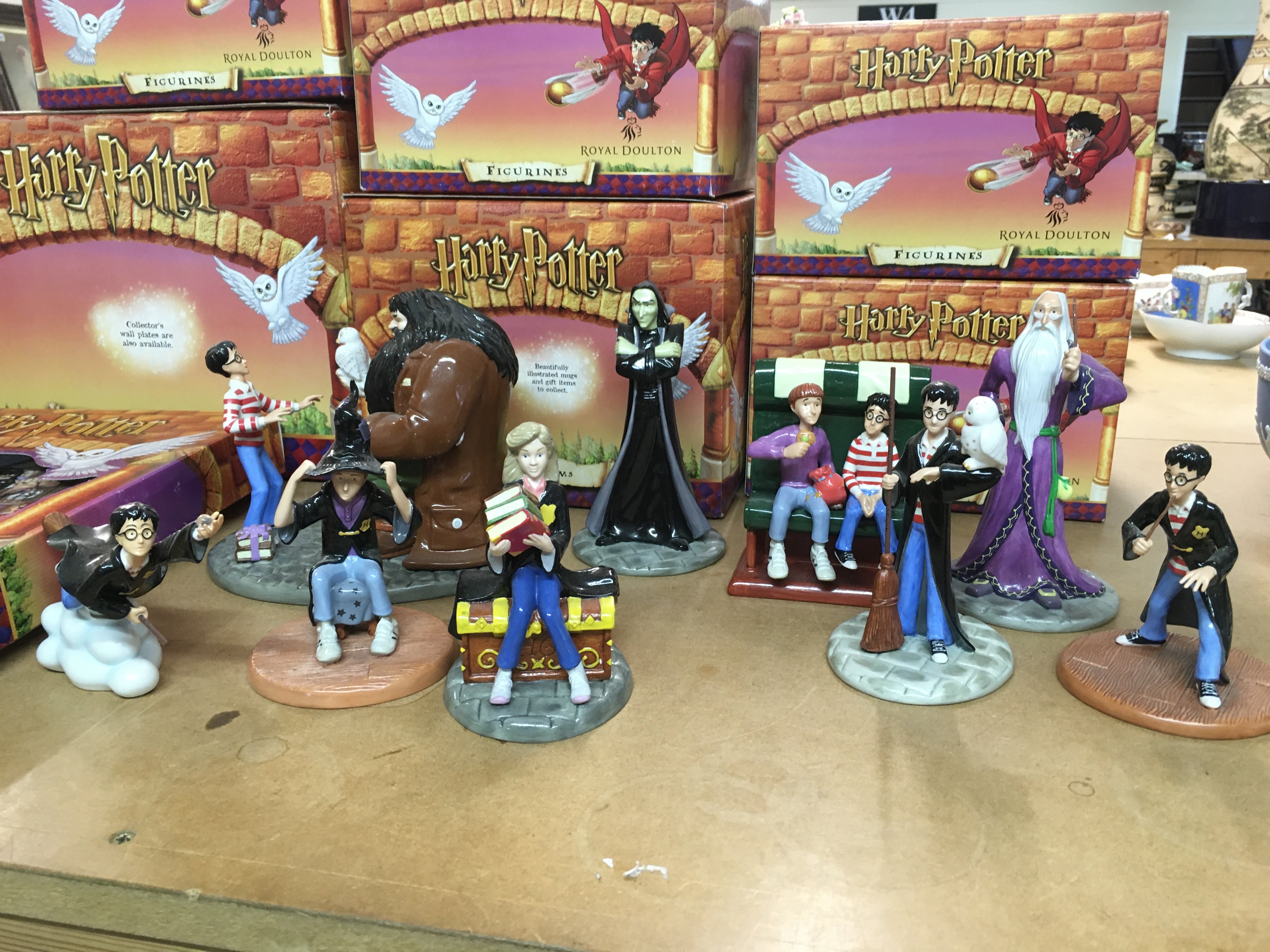 A collection of boxed Royal Doulton Harry Potter ceramic figures . This lot cannot be posted