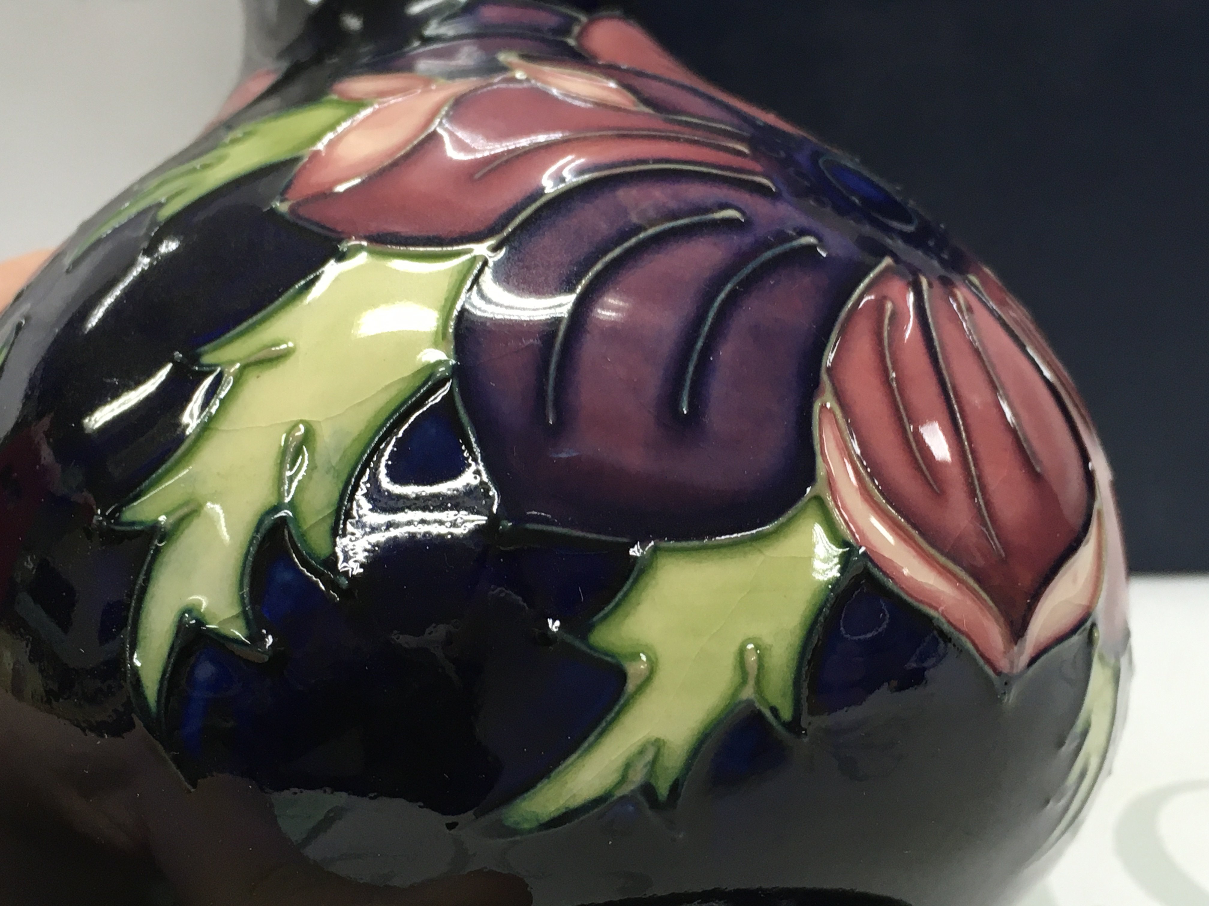 A Boxed Moorcroft Anemone vase , 16cm tall.