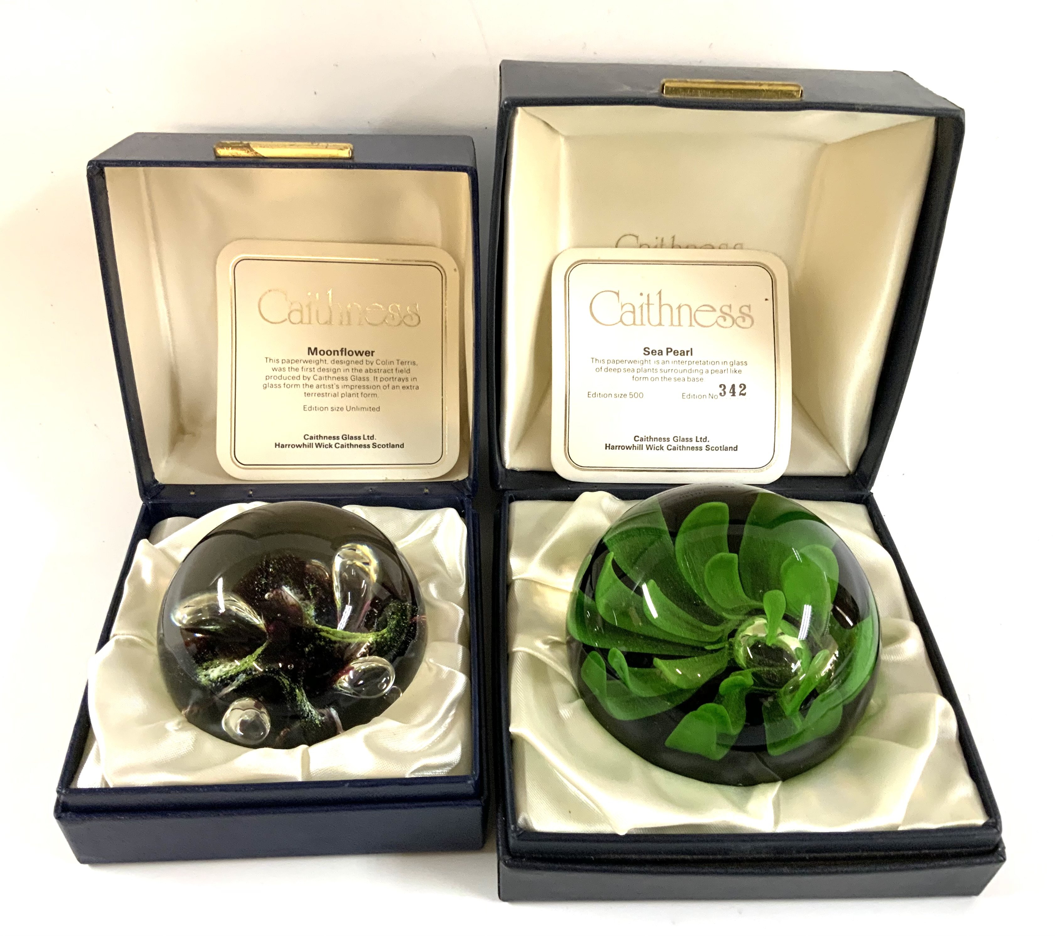 2 vintage boxed Caithness paperweights, Moonflower, Limited edition Sea Pearl 342/500, both signed.