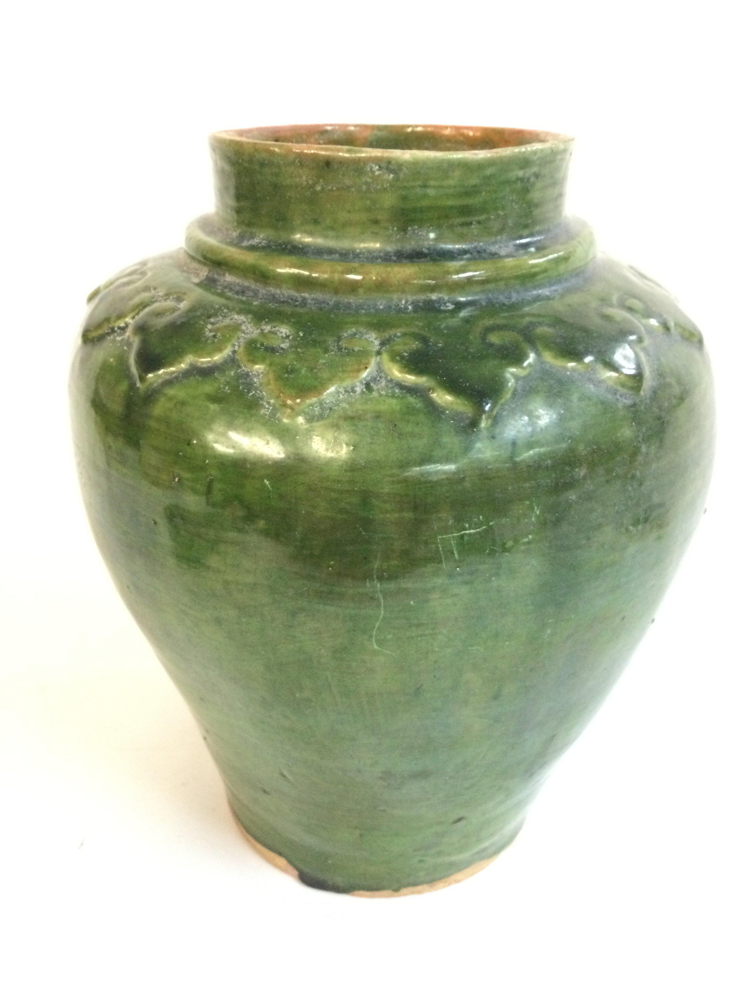 A Chinese pottery baluster vase in Kelly green , Ming style . 22cm tall. No reserve