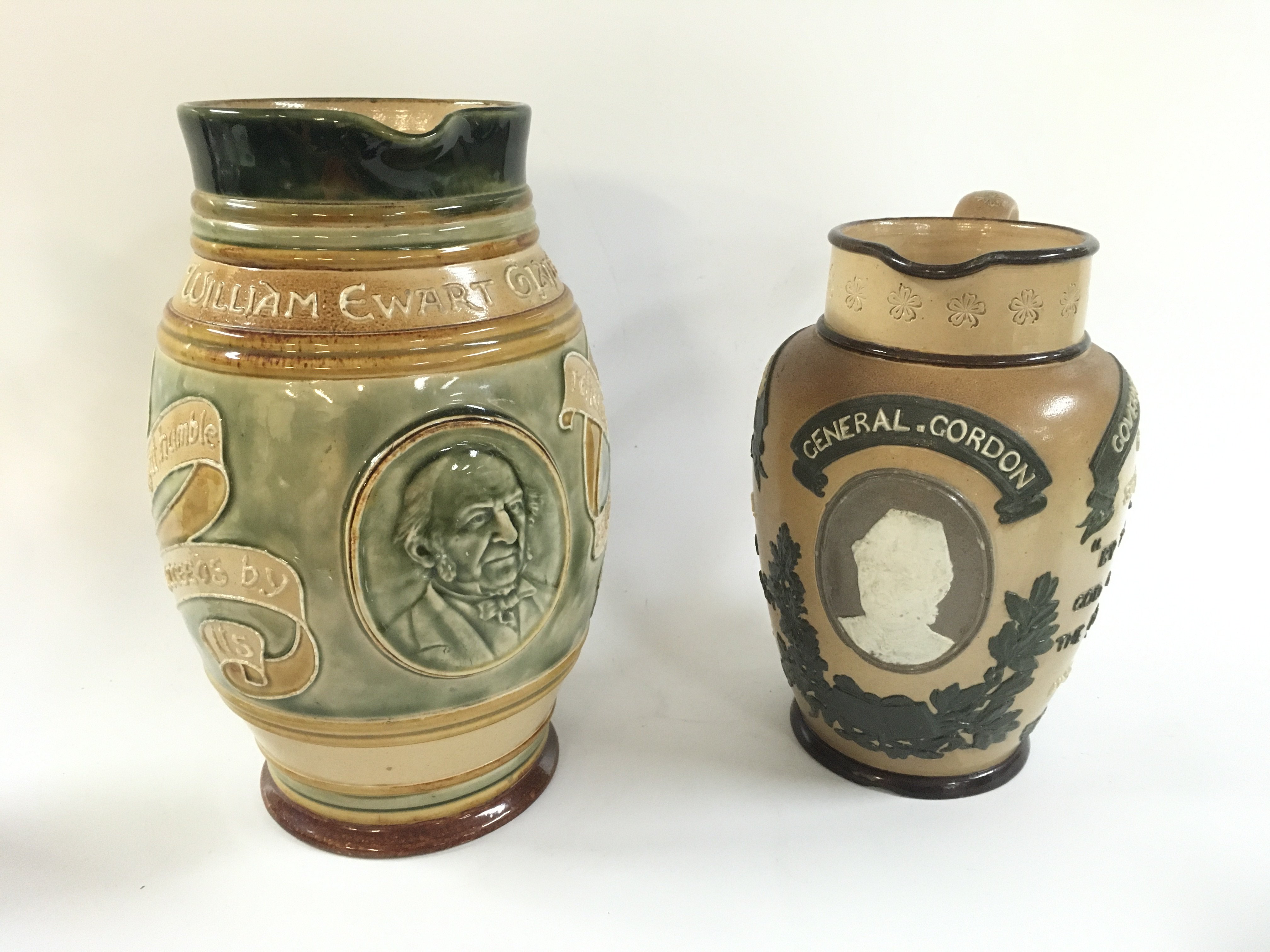 Two Doulton lambert jugs.