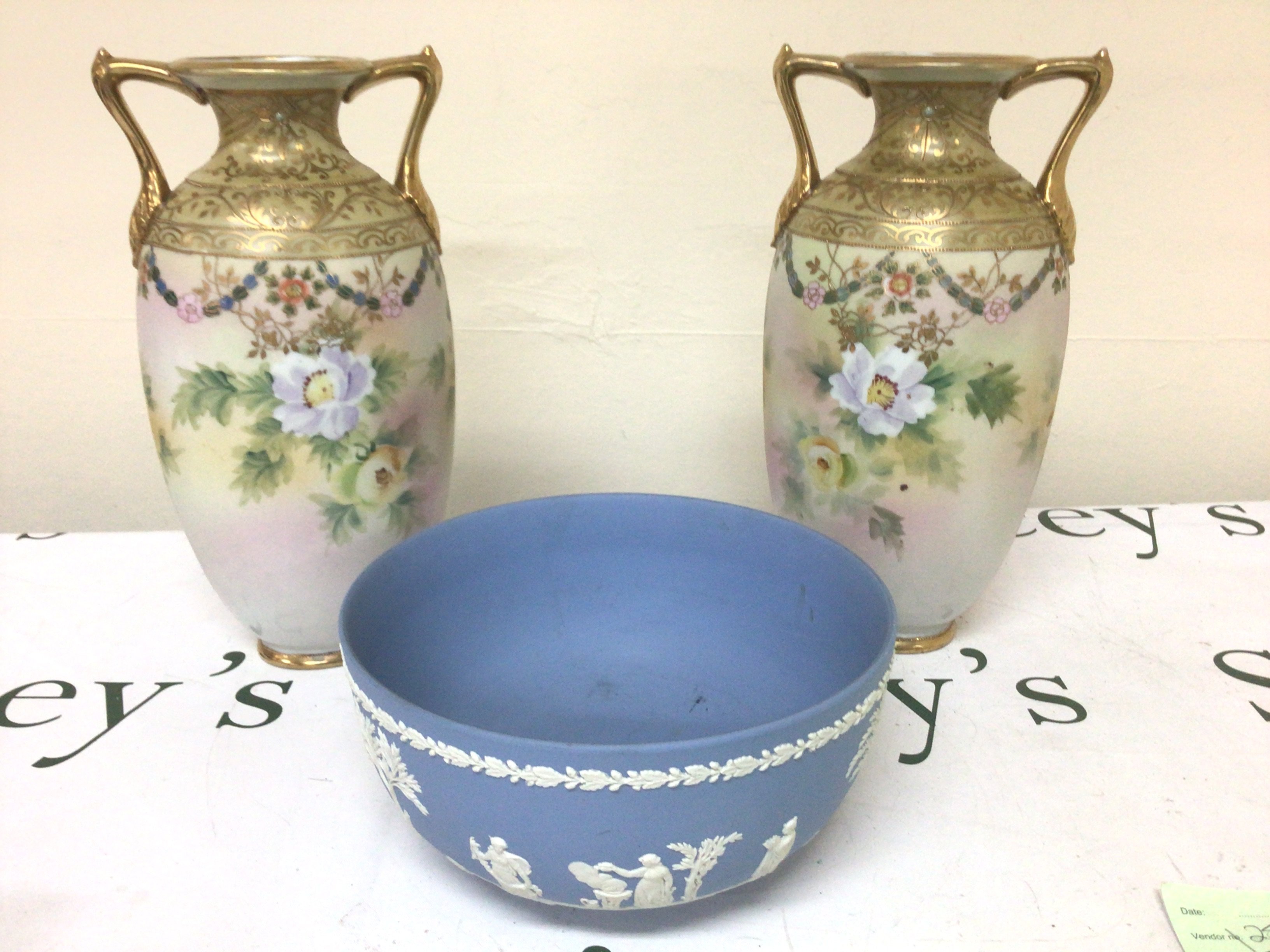 A Wedgwood jasper ware bowl and a pair of Noritaki porcelain vases decorated with flowers and gilt Hight 29cm no obvious damage (3)