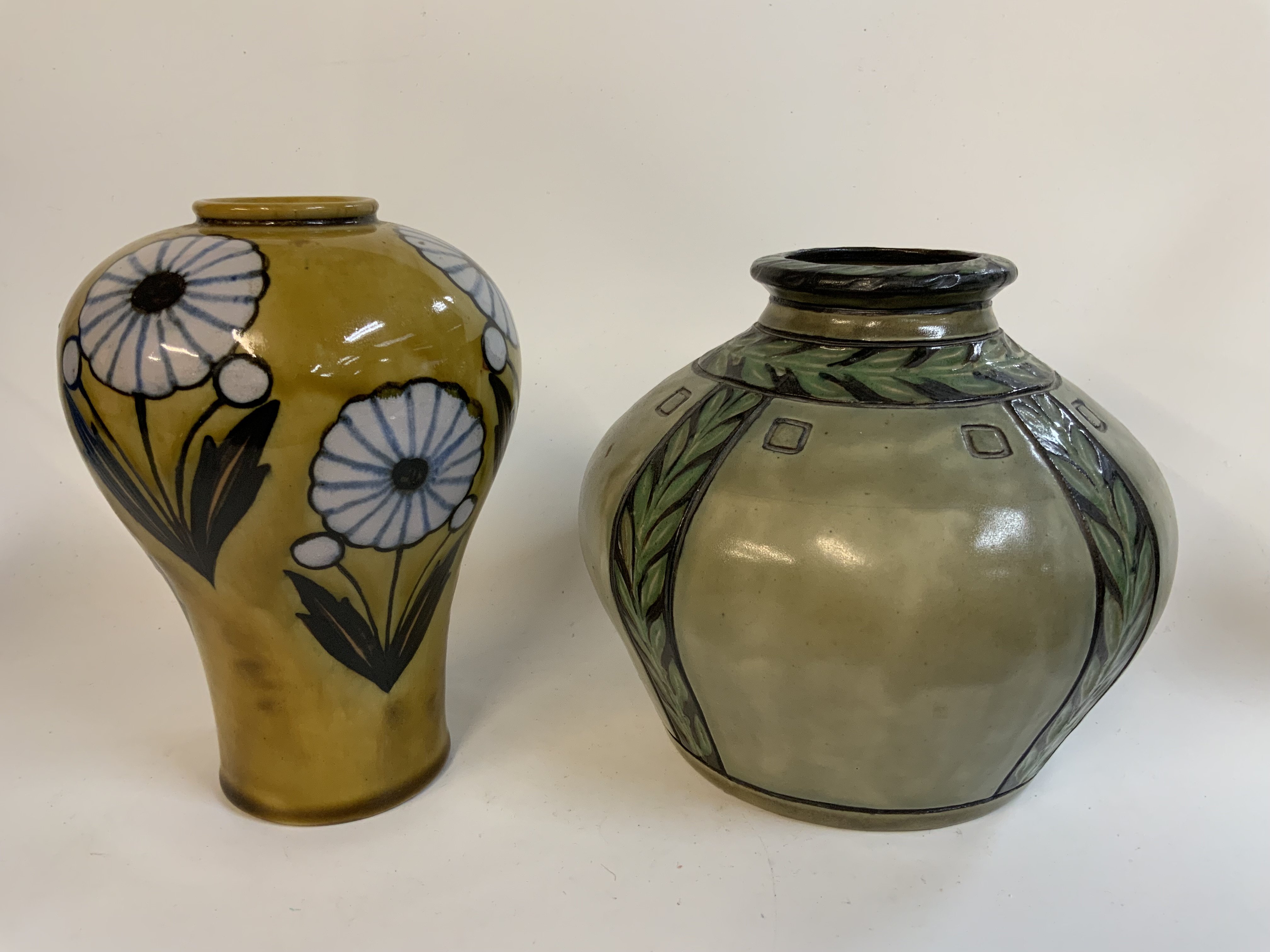 2 Royal Doulton art pottery vases.