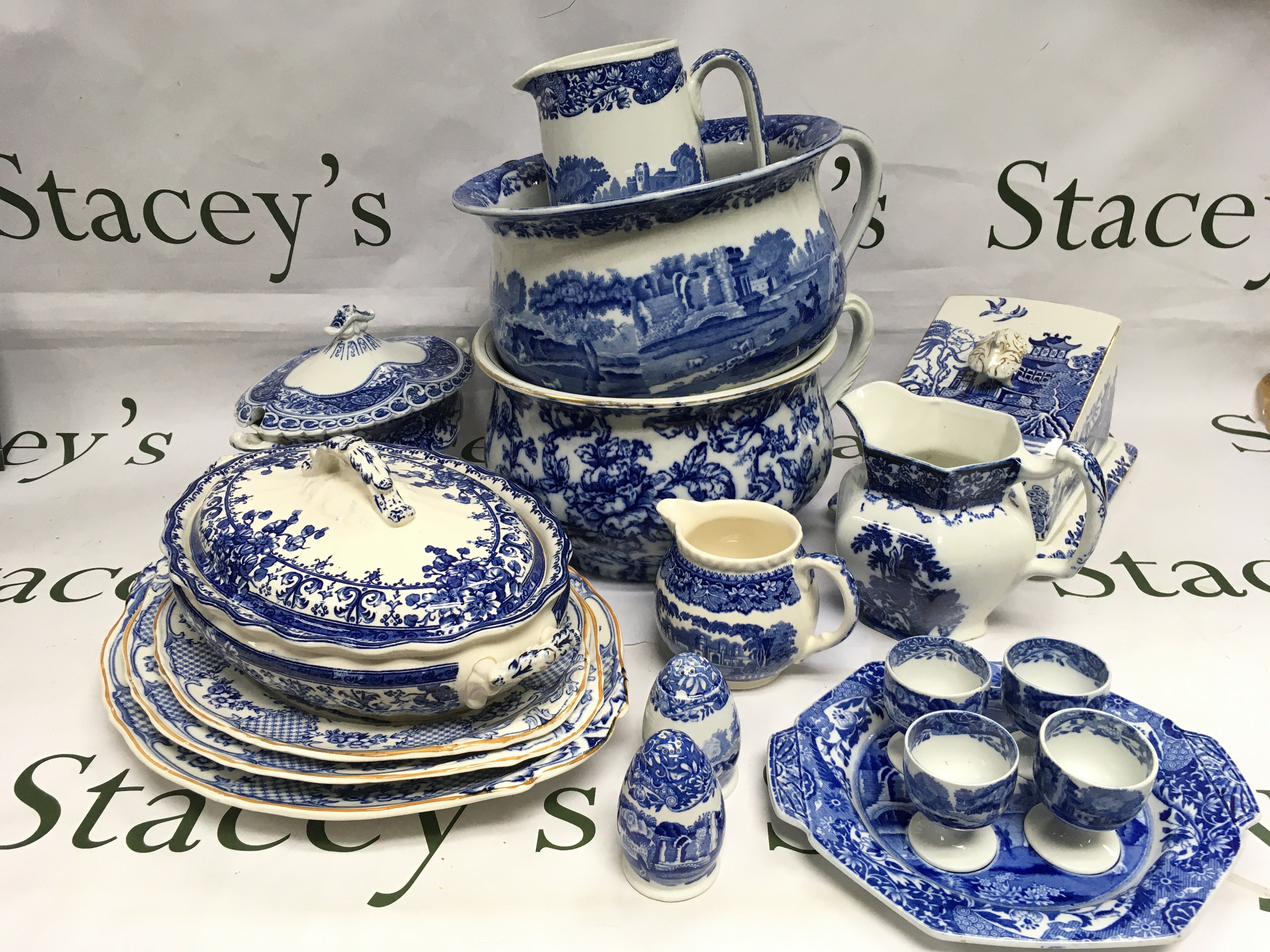 A collection of blue and white China items comprising examples of Spode and other manufacturers. Shipping category D.