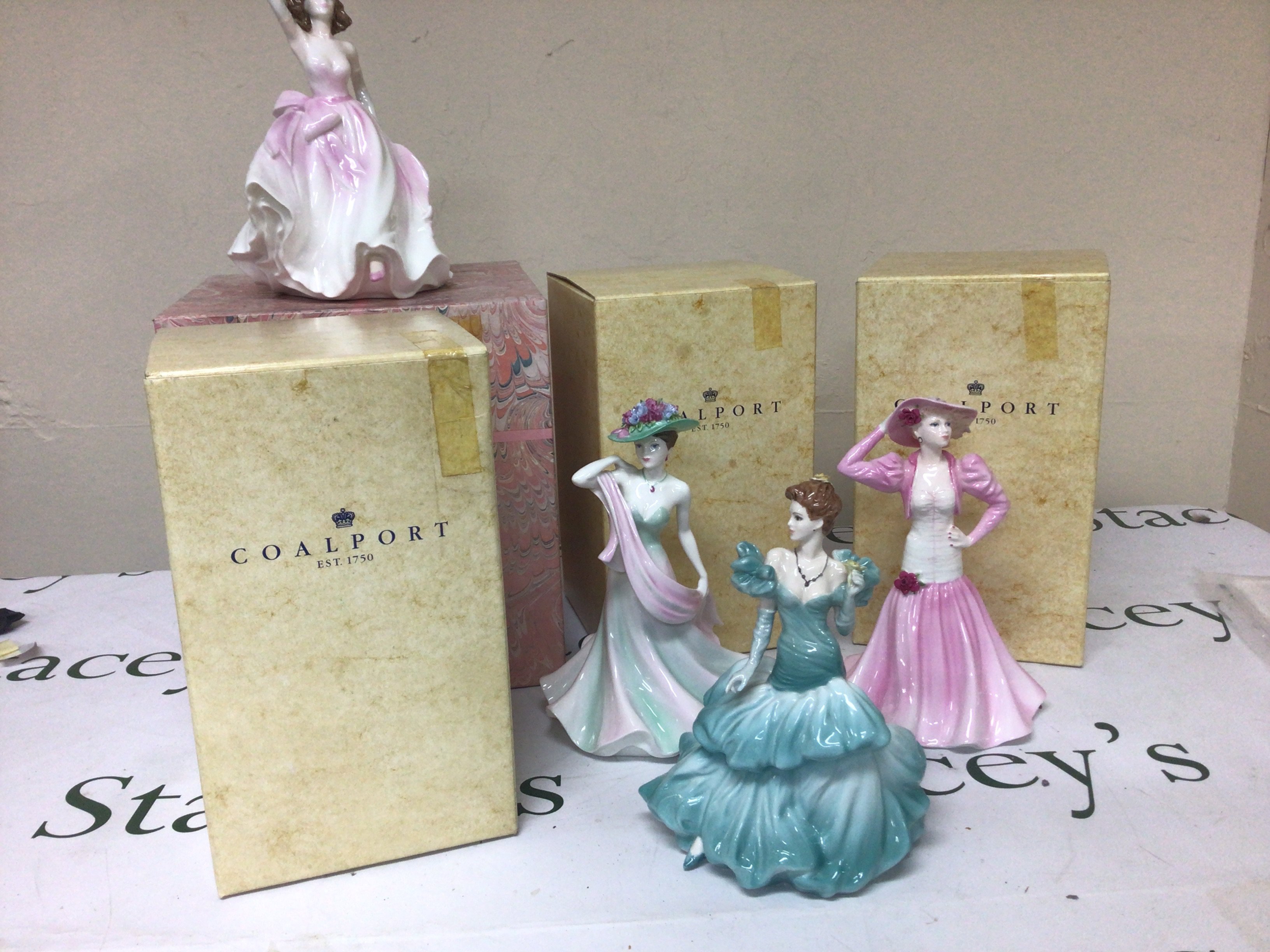 Four Coalport porcelain ladies of Fashion figures in boxes. No obvious damage. (4)