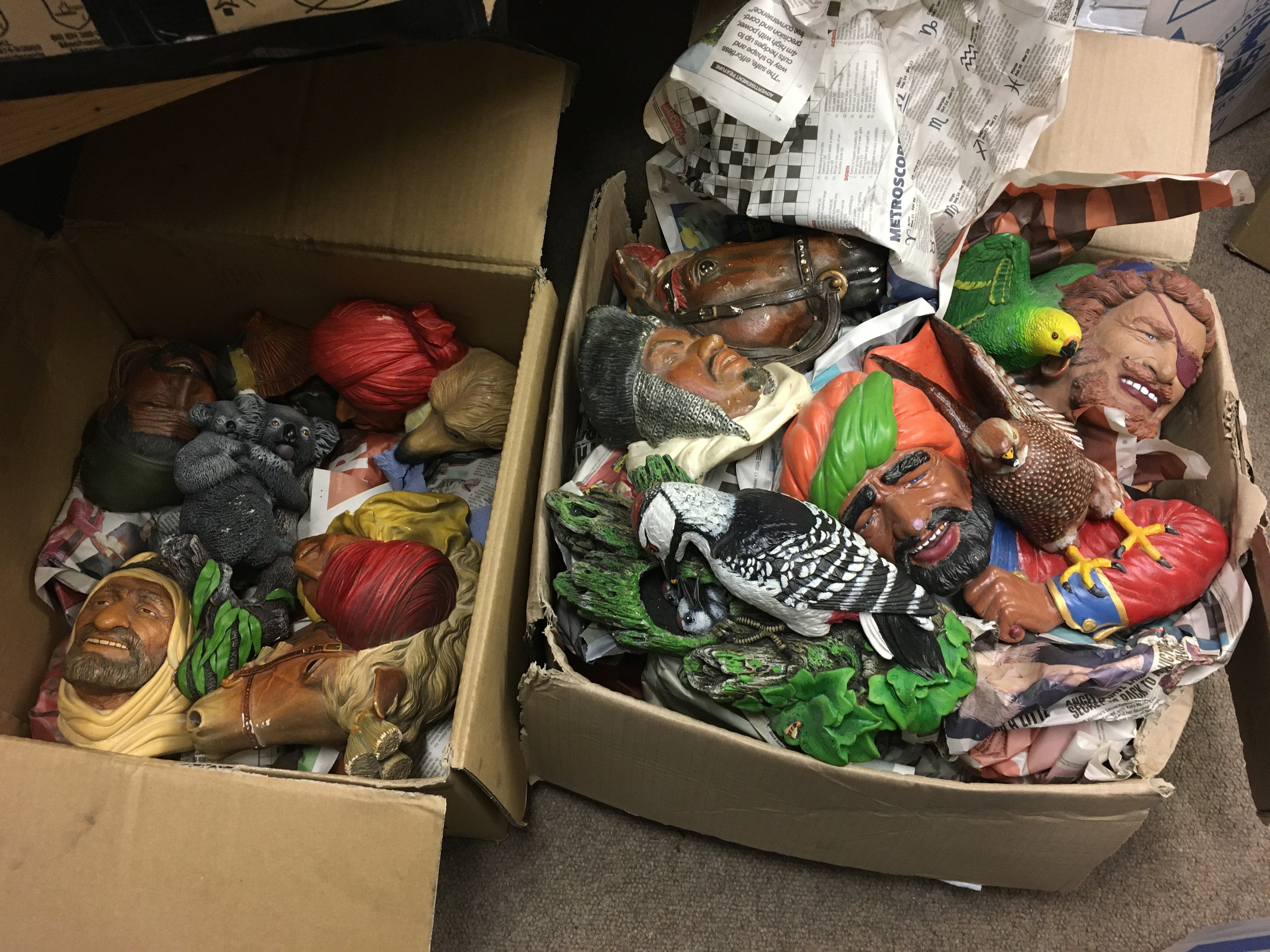 Two boxes of Bossons heads and wall plaques. Shipping category D.