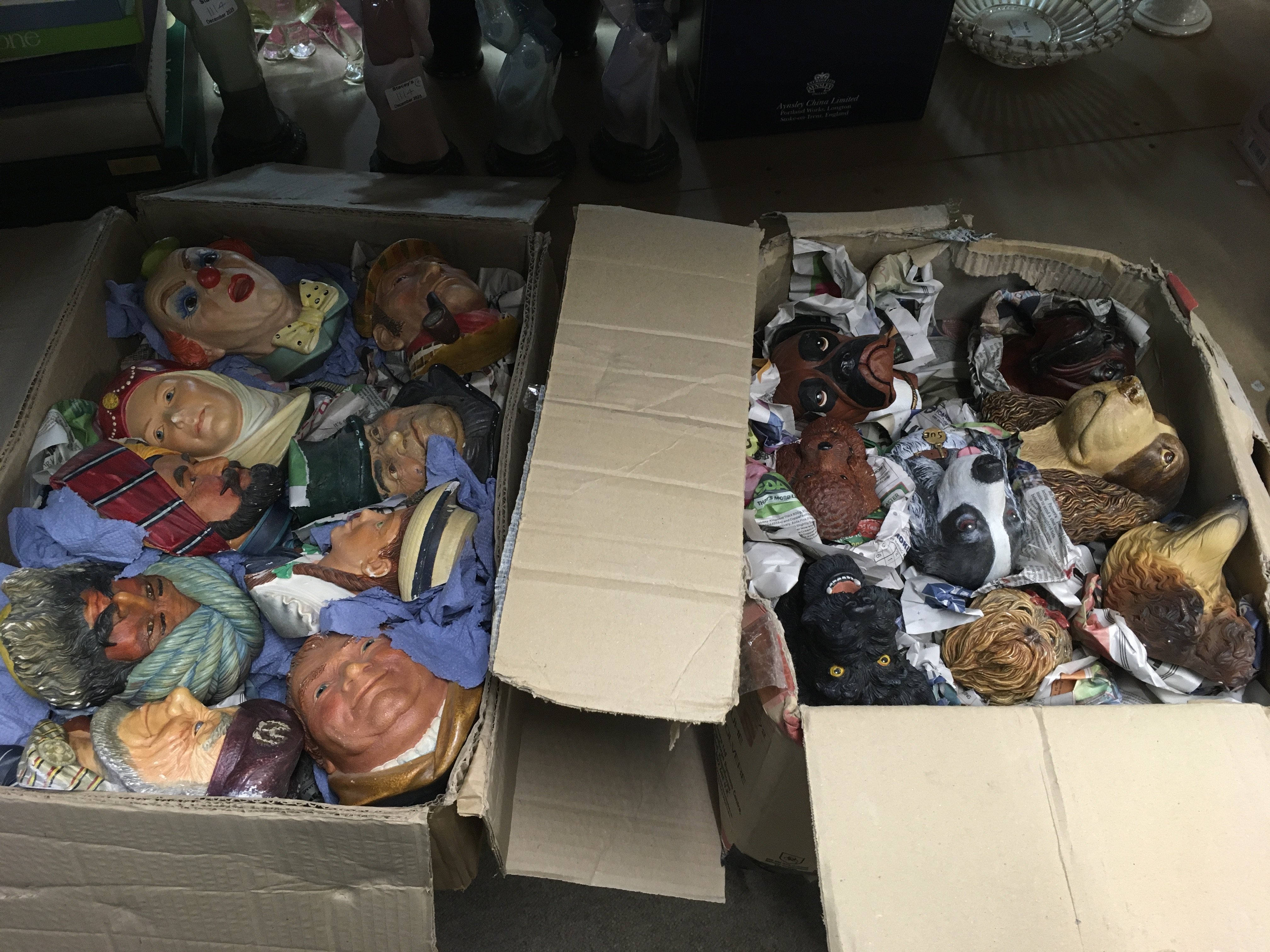 Two boxes of Bossons heads and wall plaques. Shipping category D.