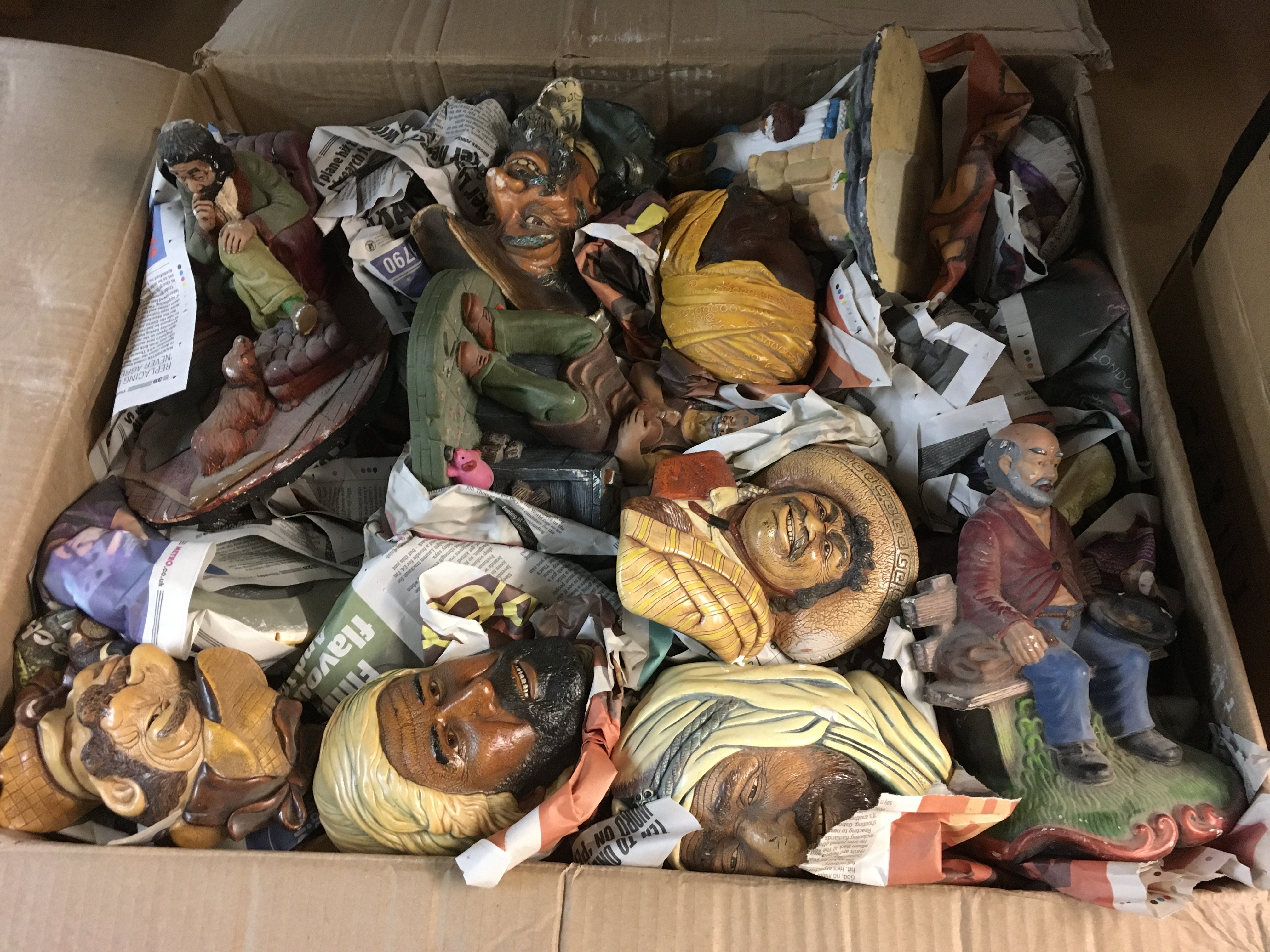 Two boxes of Bossons heads and wall plaques. Shipping category D.