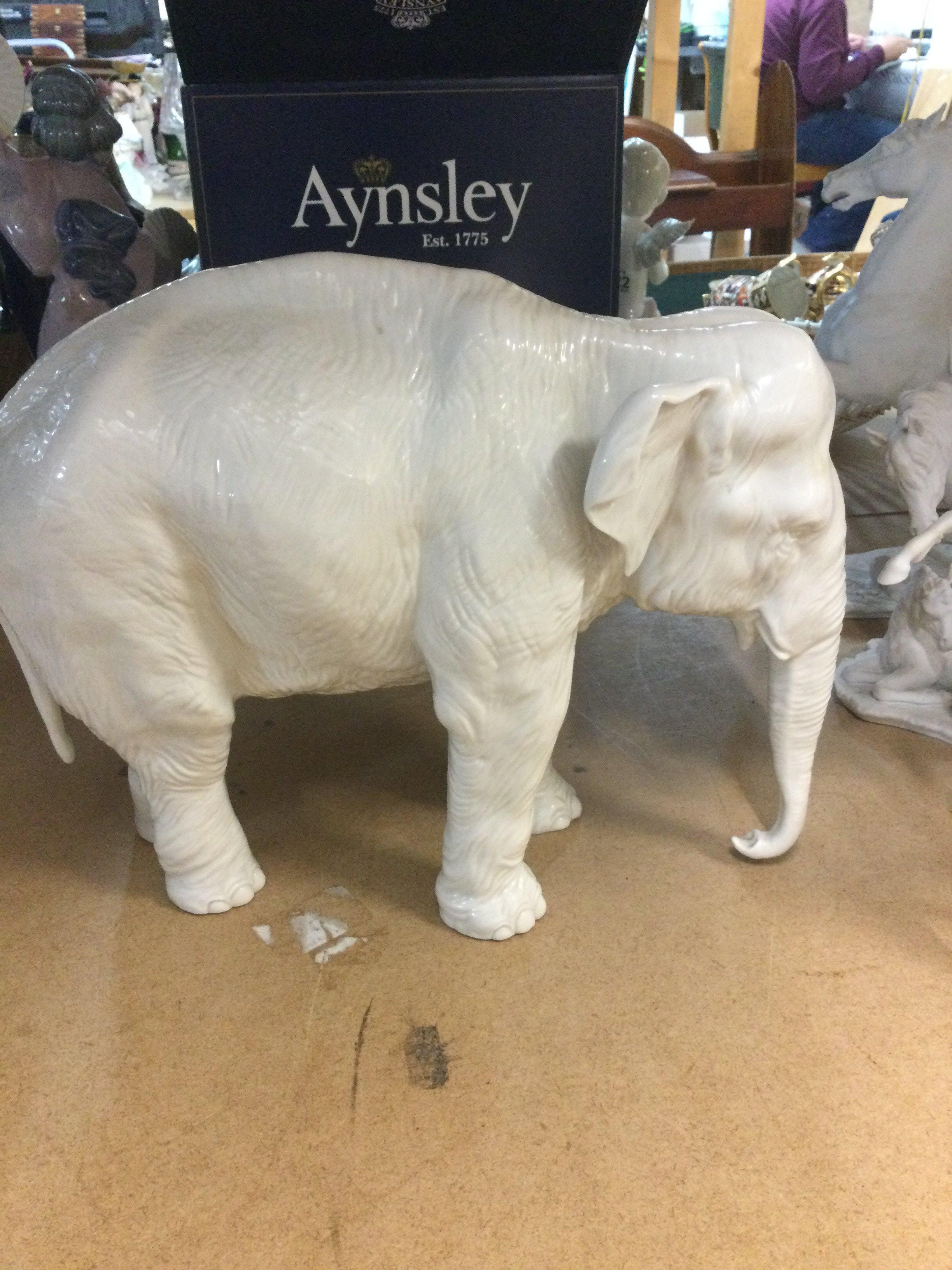 A Nymphenburg porcelain figure in the form of a Indian Elephant 28 x 23 cm ,