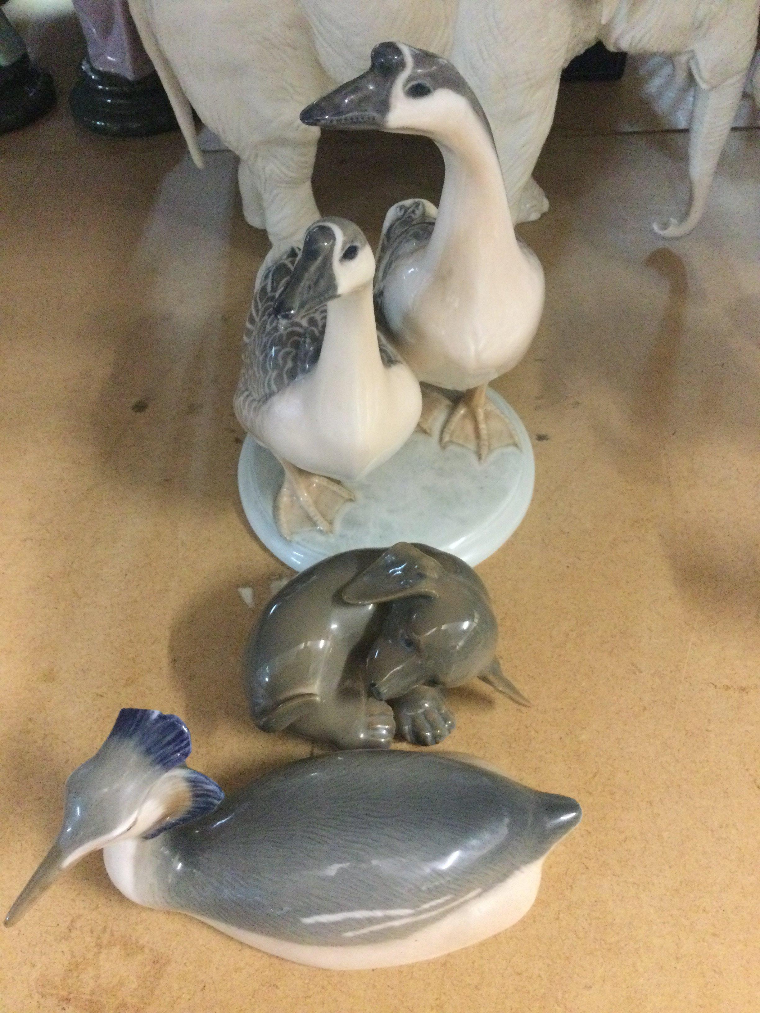 Three Copenhagen figures in the form geese a dog and a Grebe .