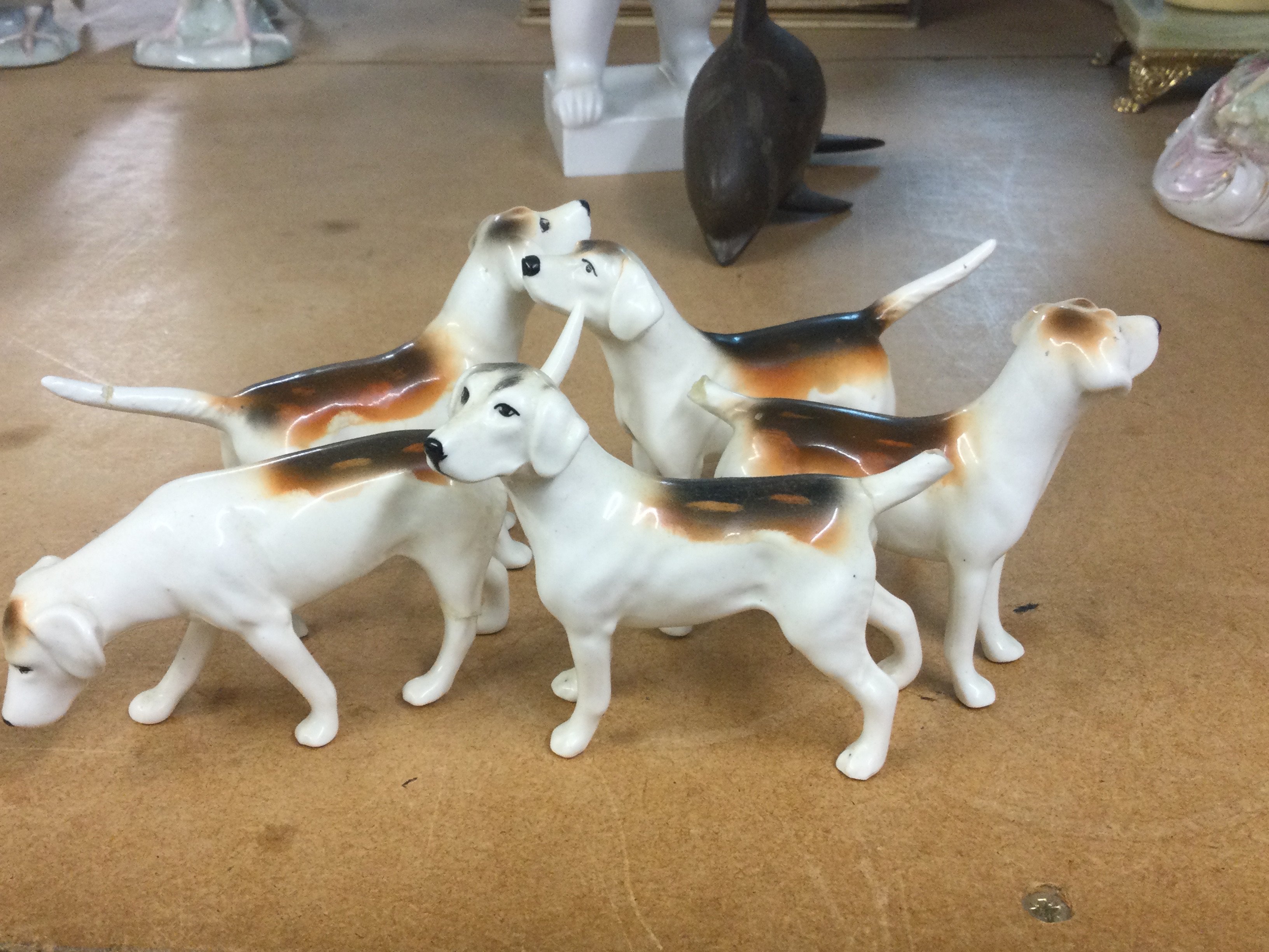 A collection of five Beswick hounds .