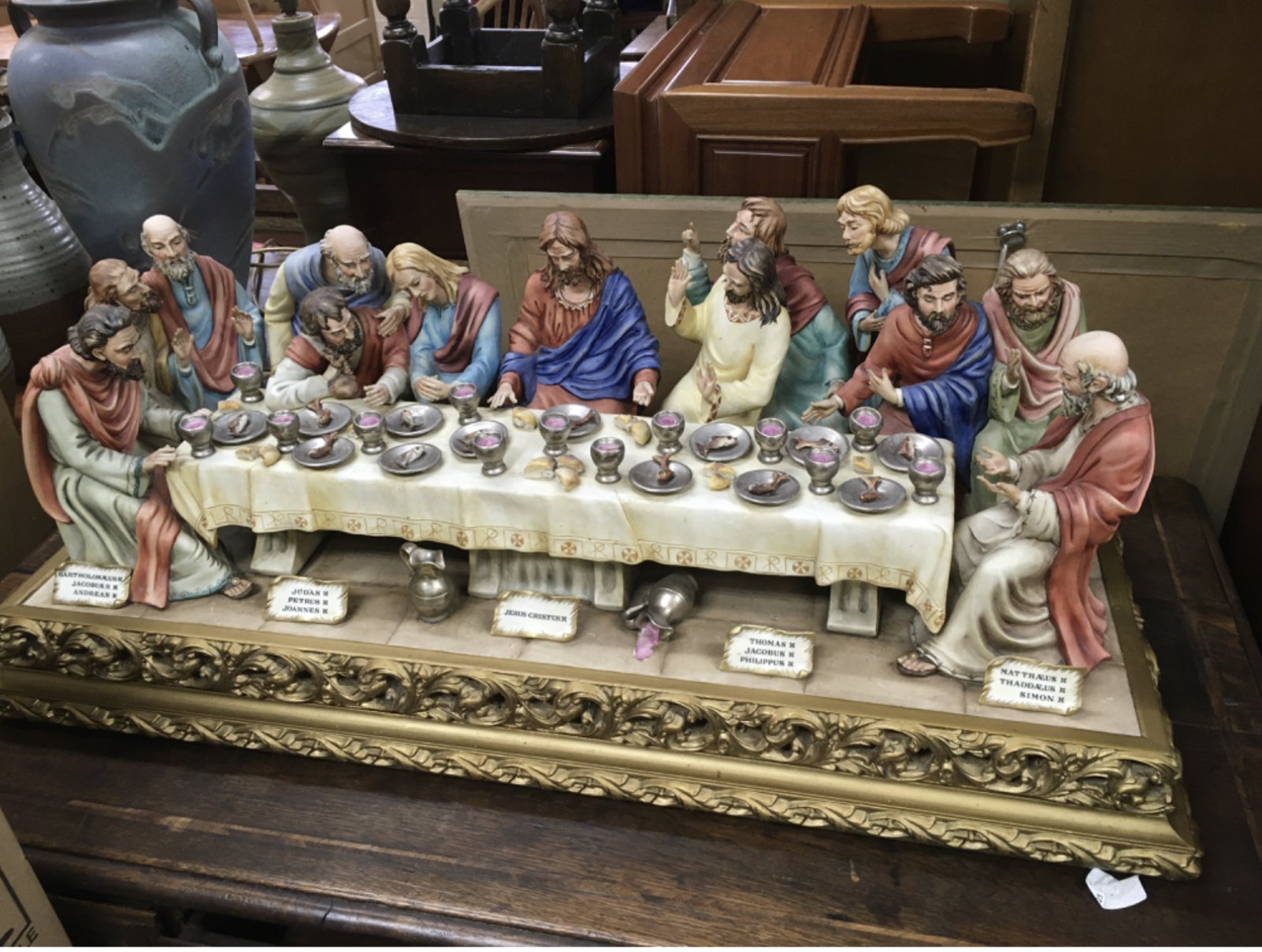 A large Capodimonte figural group of the last supper, approx length 85cm. Shipping category D.