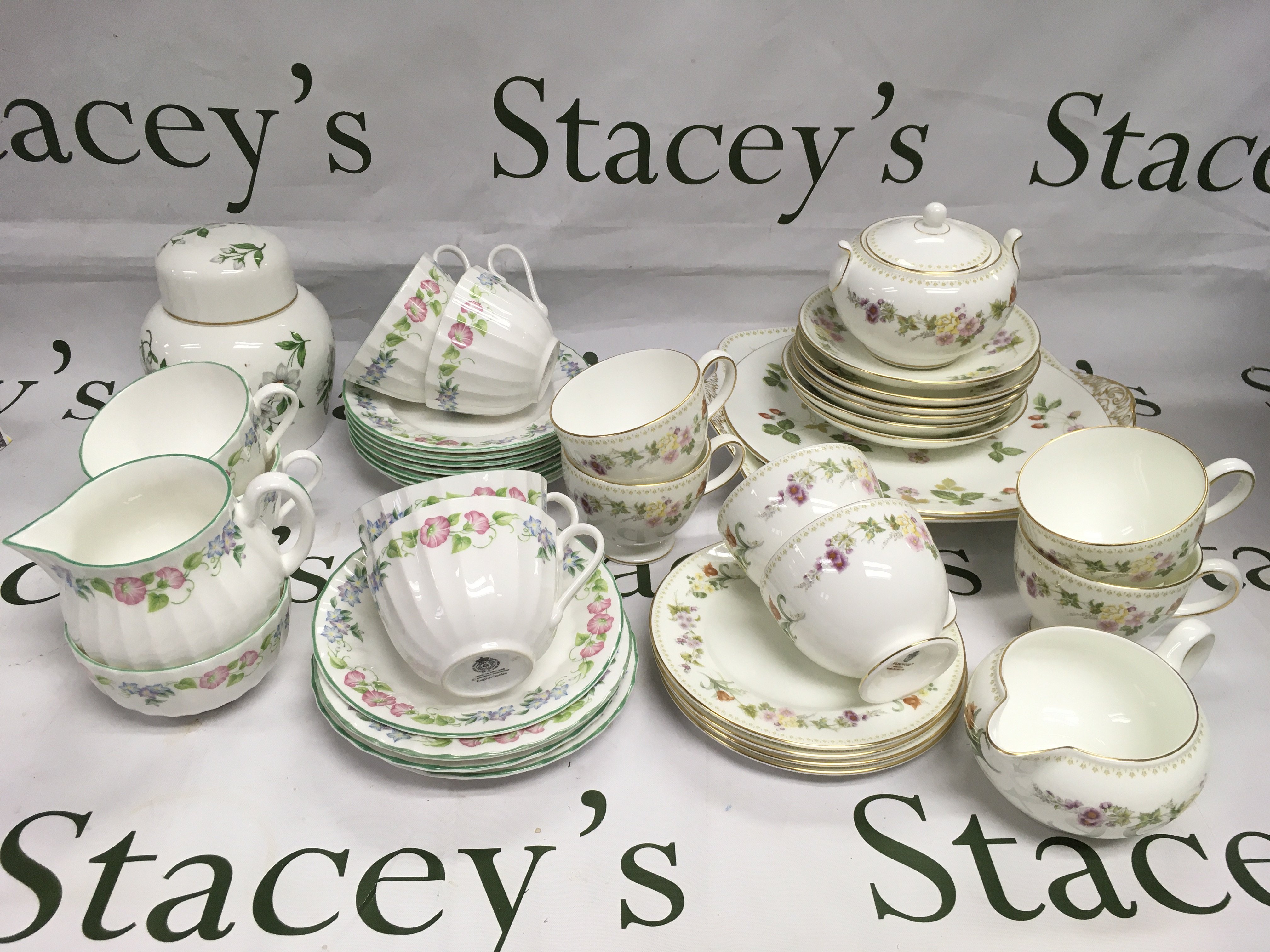 Two tea sets comprising Wedgwood 'Mirabelle' and Royal Worcester 'English Garden'. Shipping category D.