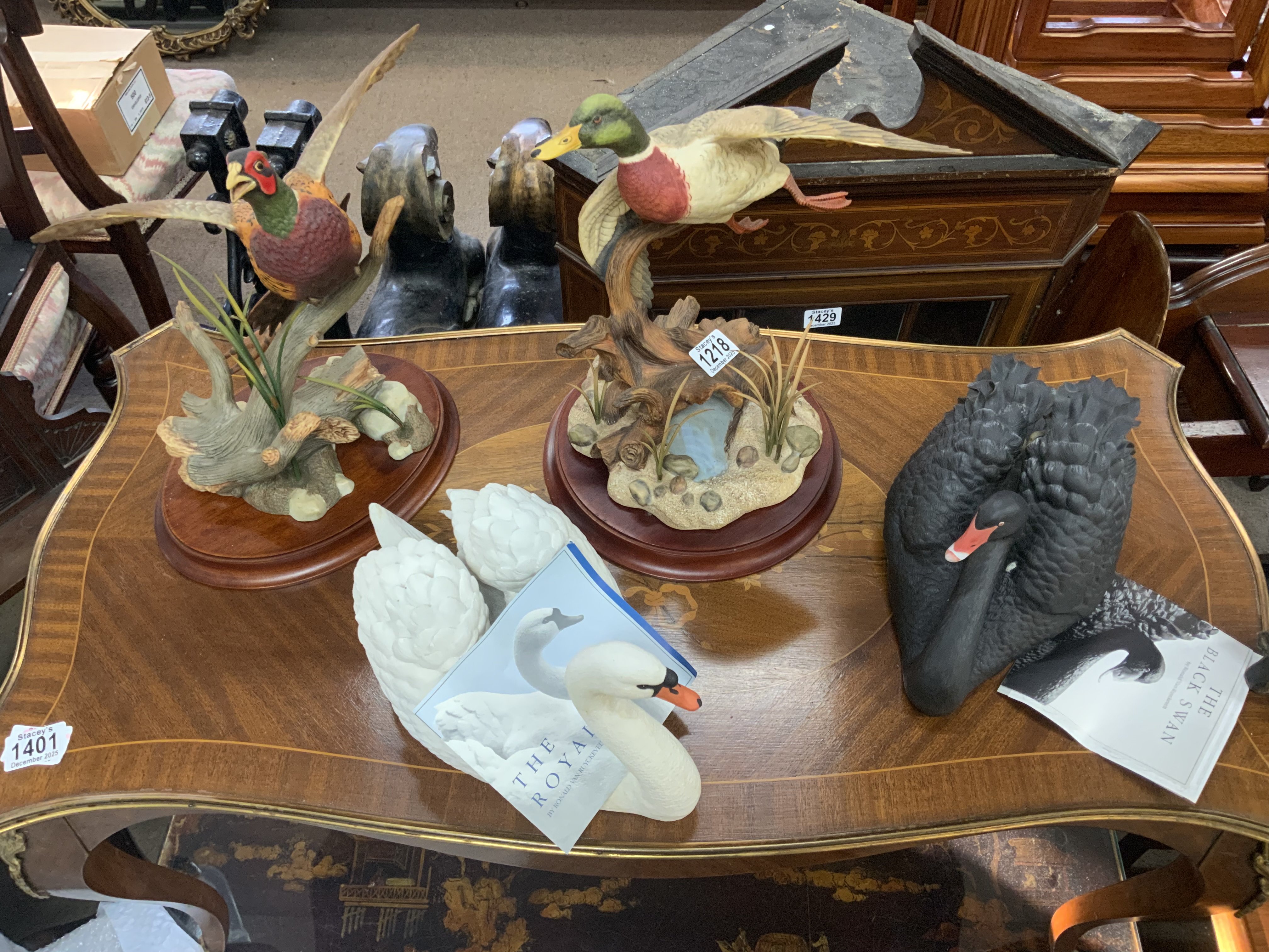4 Franklin mint porcelain sculptures to include, a Pheasant, The Mallard, The Black Swan, The Royal Swan