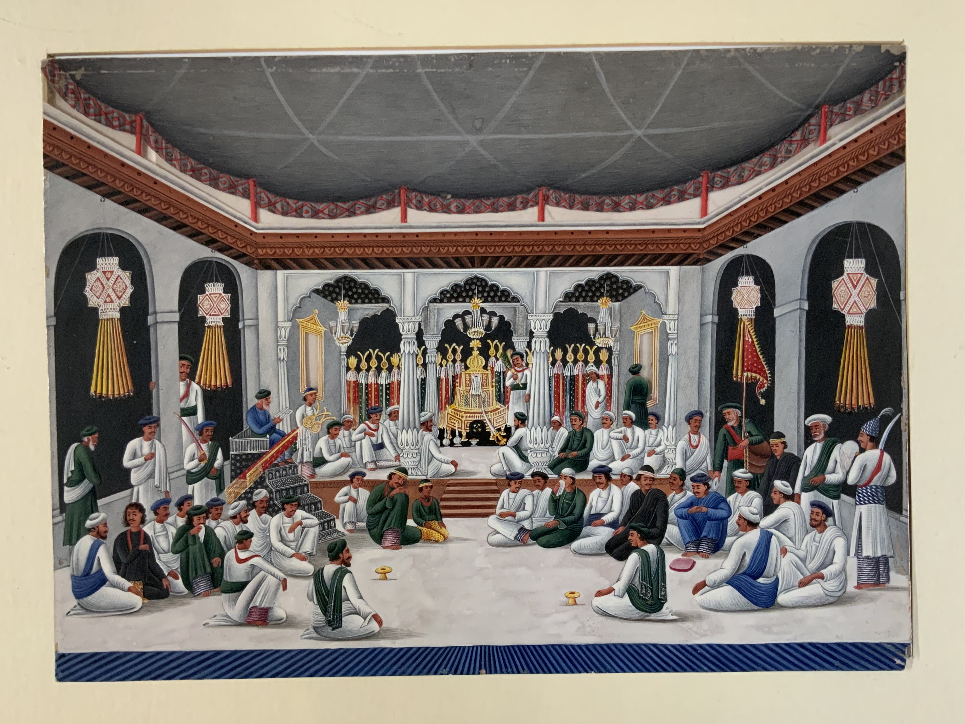 Two 19thC gouache paintings on Mica, 1 depicting the interior of a mosque at the Muharram festival, 2 depicting figures smoking a Hookah pipe with musicians. (1 framed) each 24cm x 17cm.