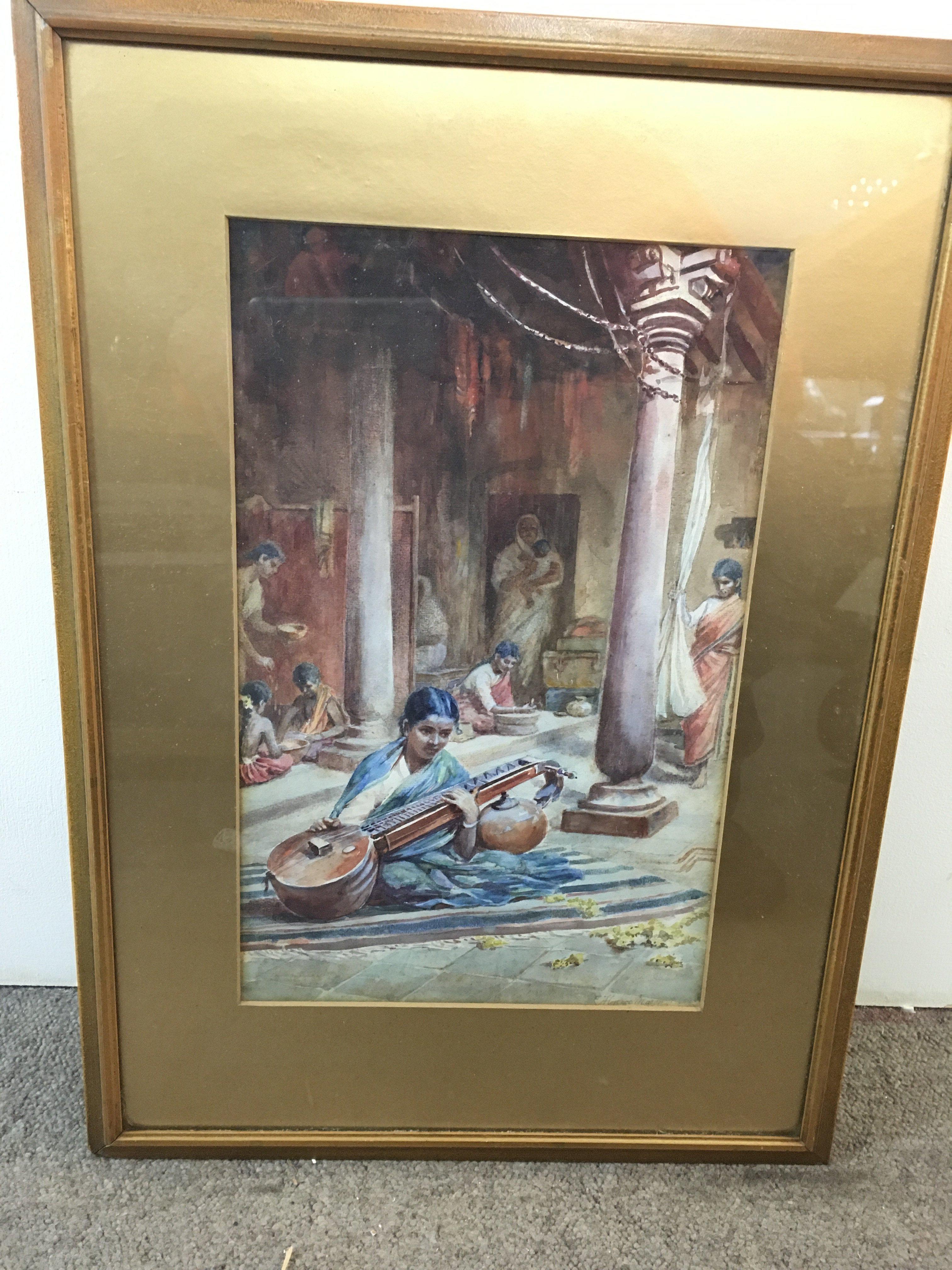 A framed watercolour of figures at a Hindu temple, signed by Emily Florence mason. Approx Size 43x59cm.