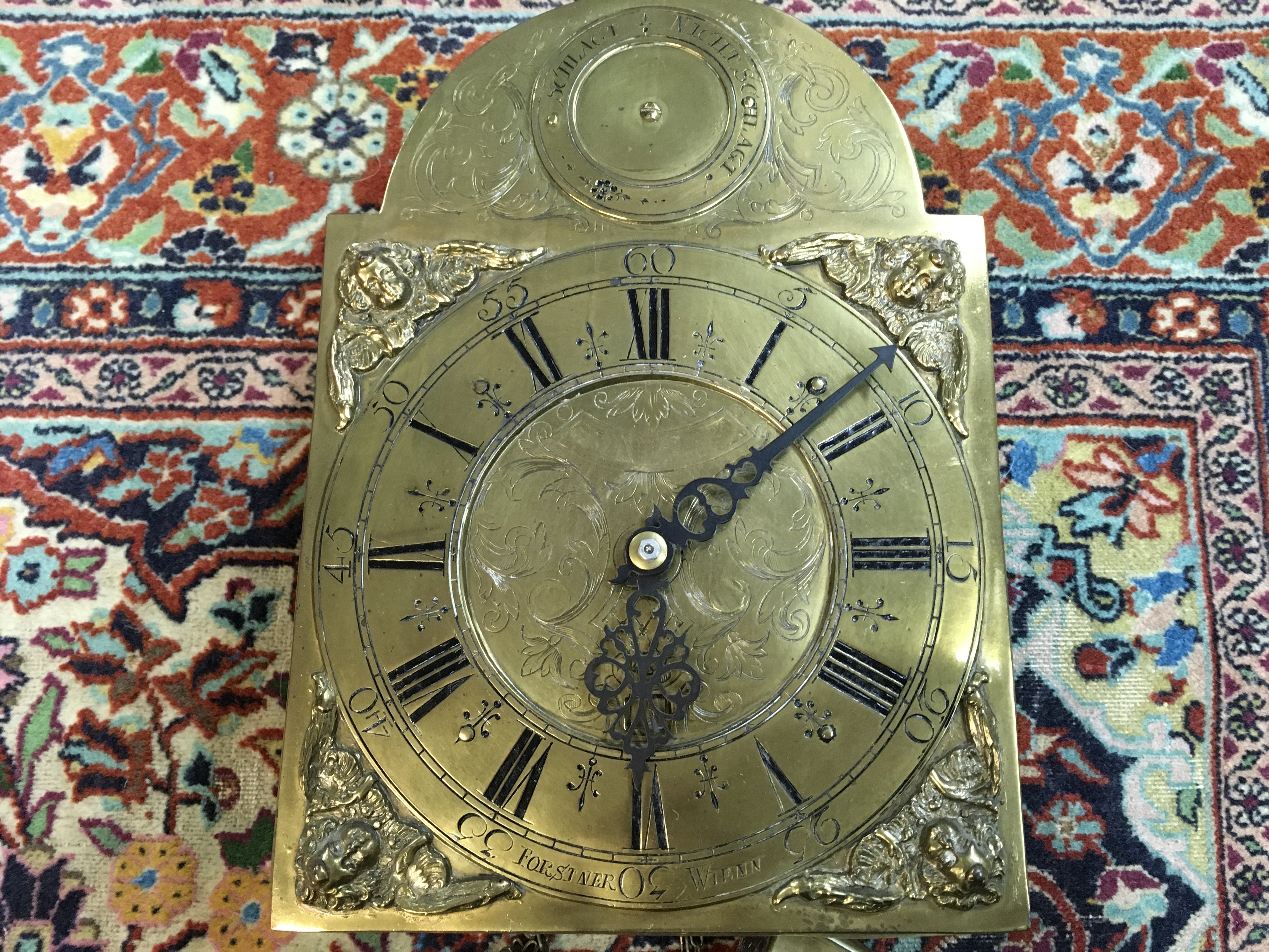 A German brass dial wall clock . Postage cat b- NO RESERVE