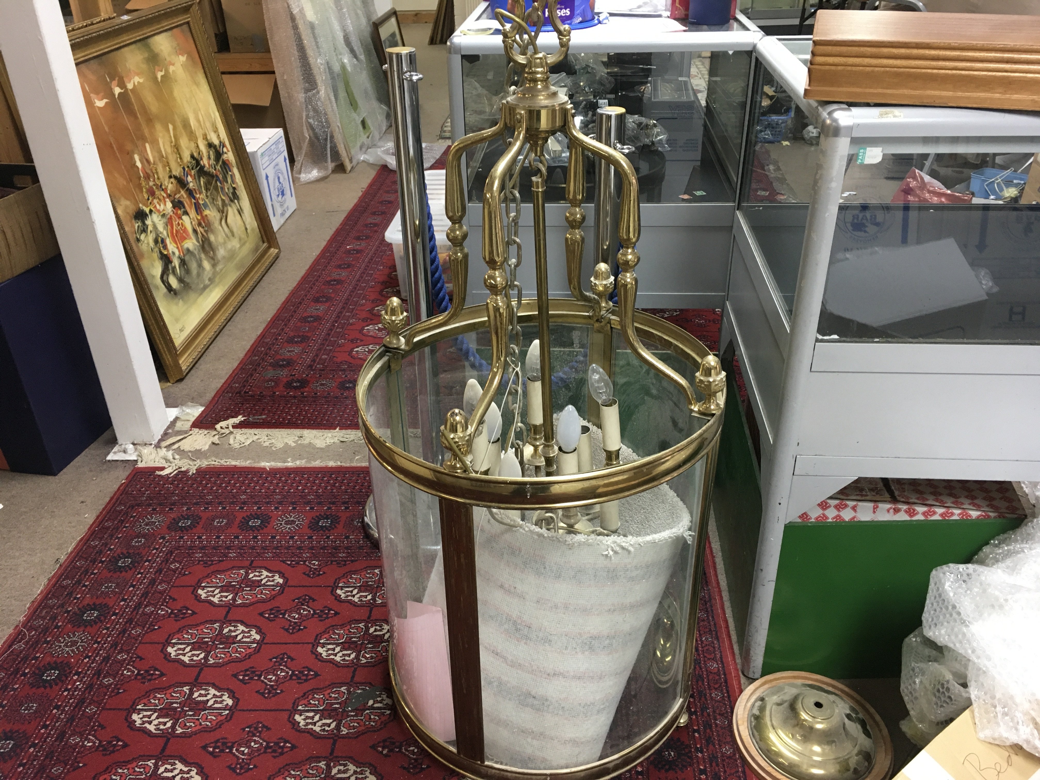 A large curved glass light fitting