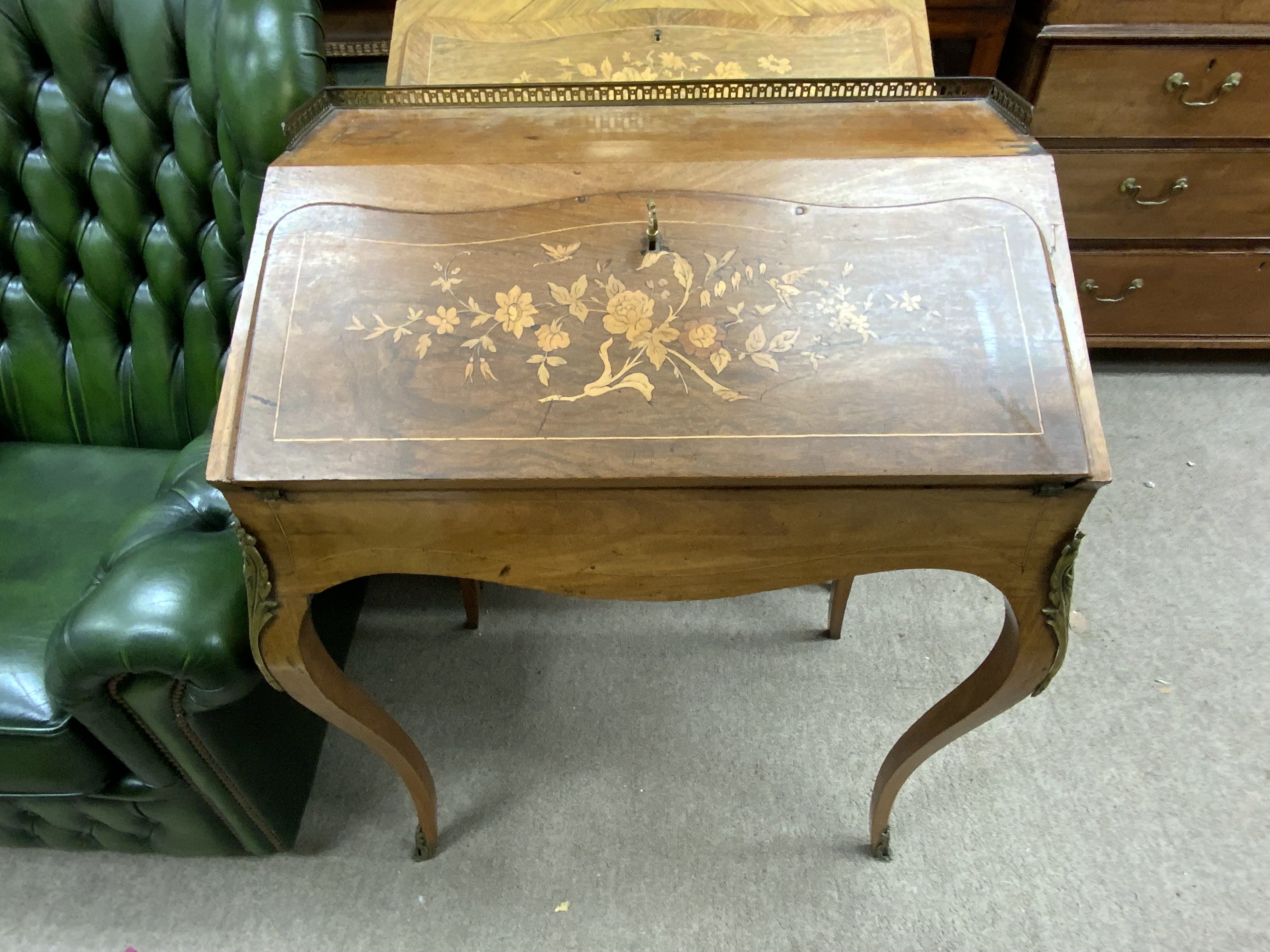 An inlaid french bureau 66cm wide 90cm tall 46cm
