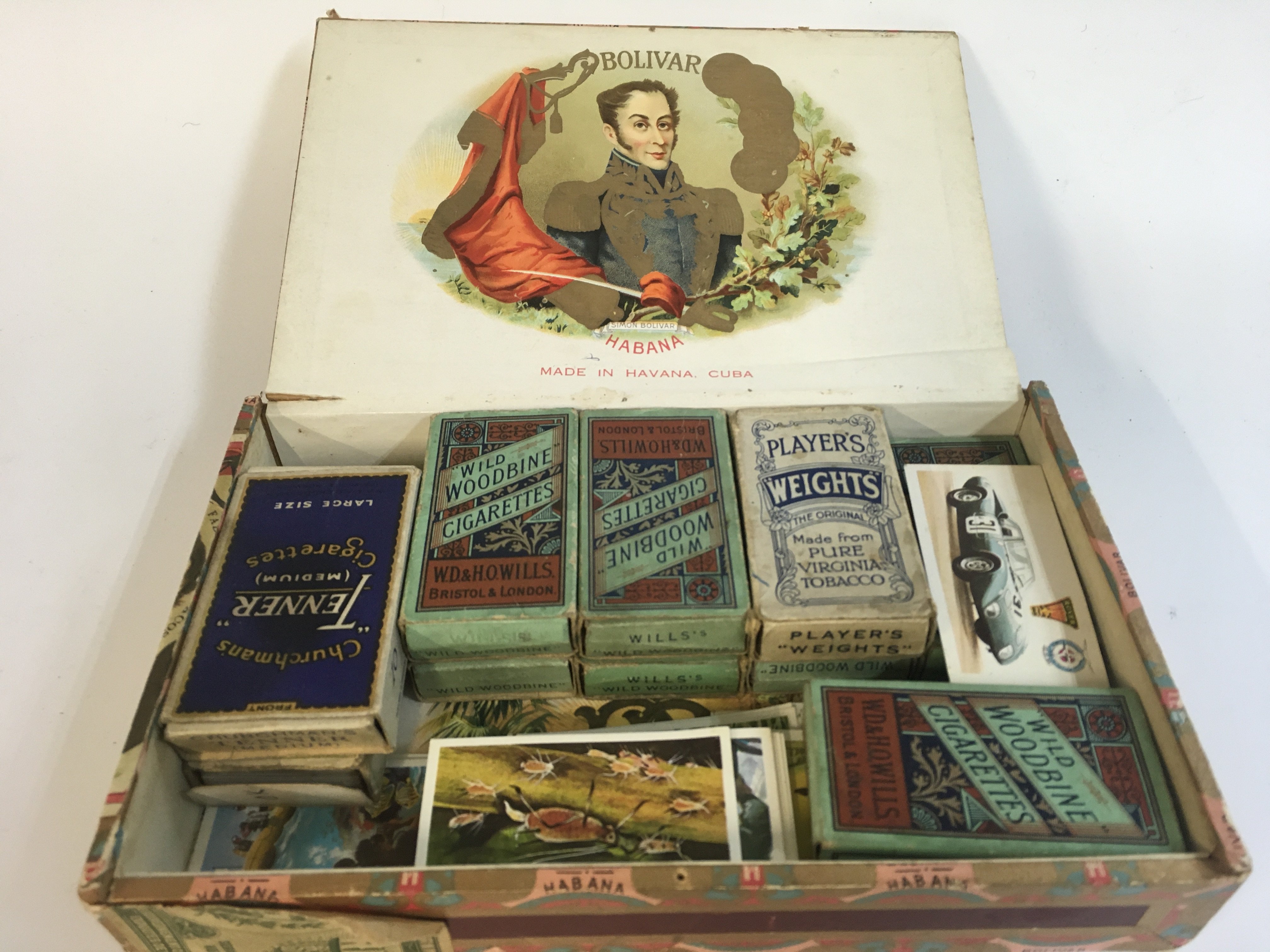 A Collection of cigarette cards including Wills. Postage category b
