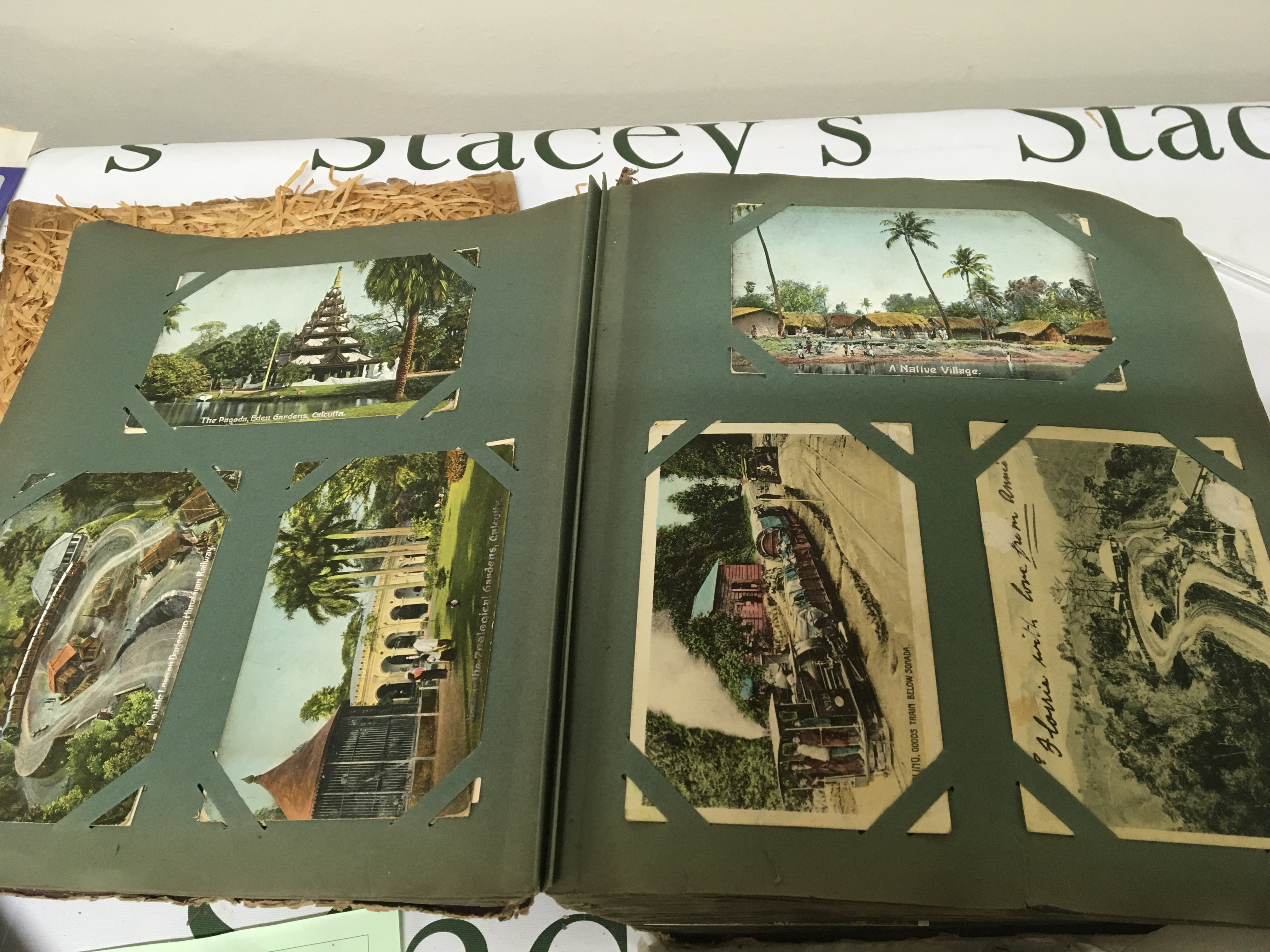 An early 20th century postcard album containing a very good and comprehensive collection of postcards including French I world war cards many other world cards New York some shipping cards including a Edwardian White Star line card British landmarks Townd Indian cards and more