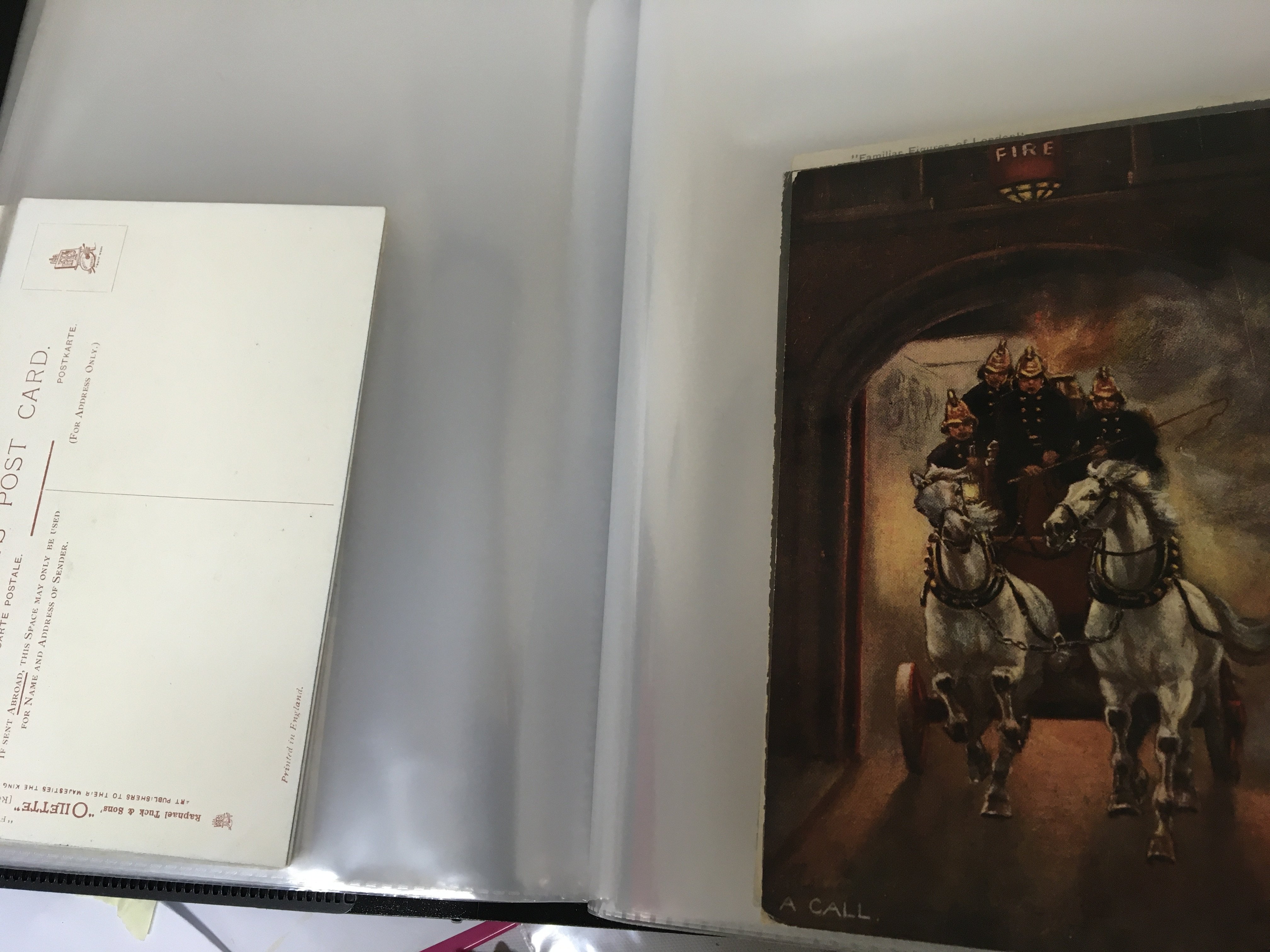 A box containing vintage cigarette cards first day covers Vintage postcards including Themed Tuck cards Police Fireman street scenes. other ephemera playing cards etc ..- NO RESERVE