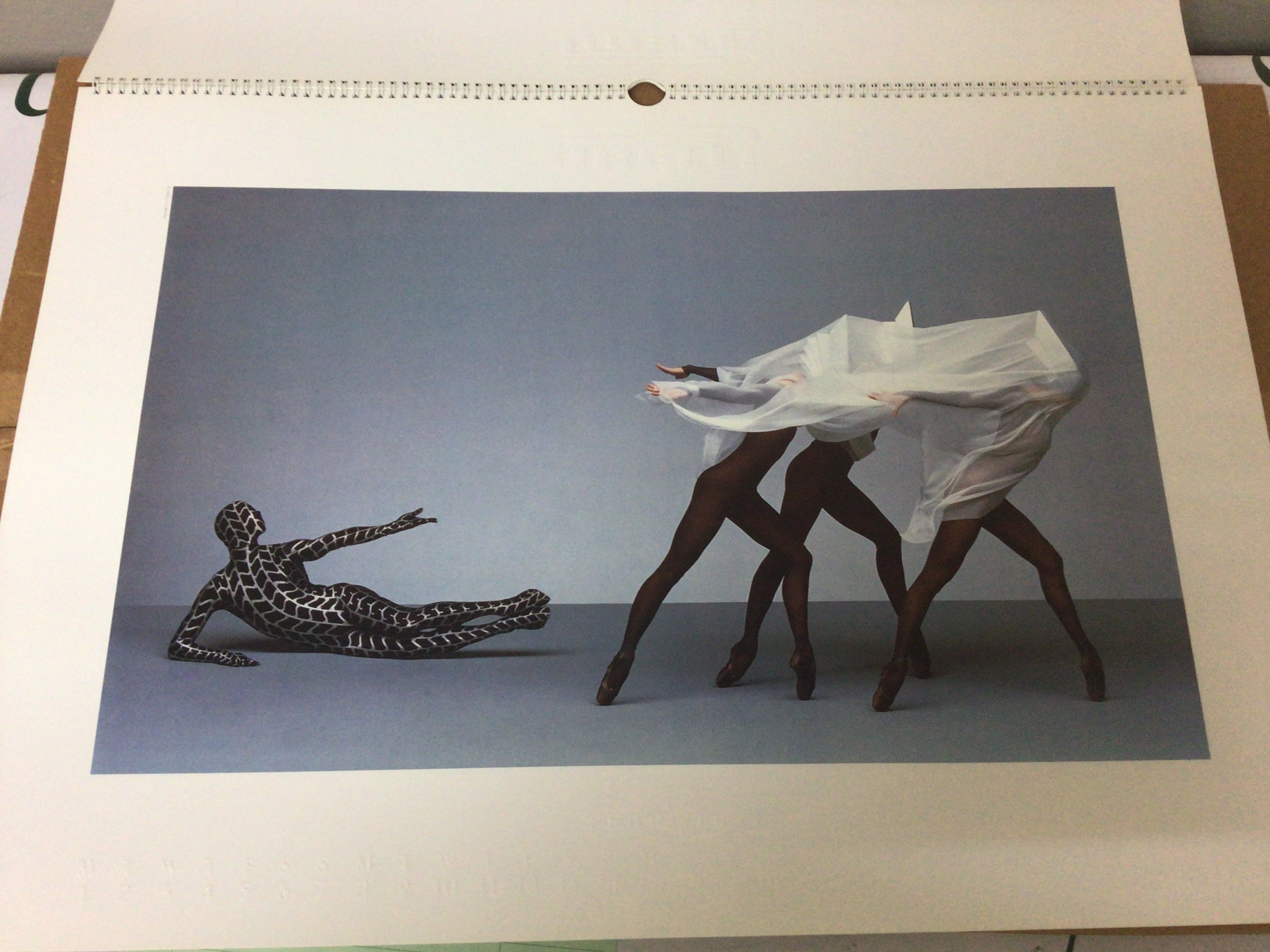 A collection of Guinness Advertising Calendars posters and 1988 19The Pirelli calendar and others and a large coaching history book.