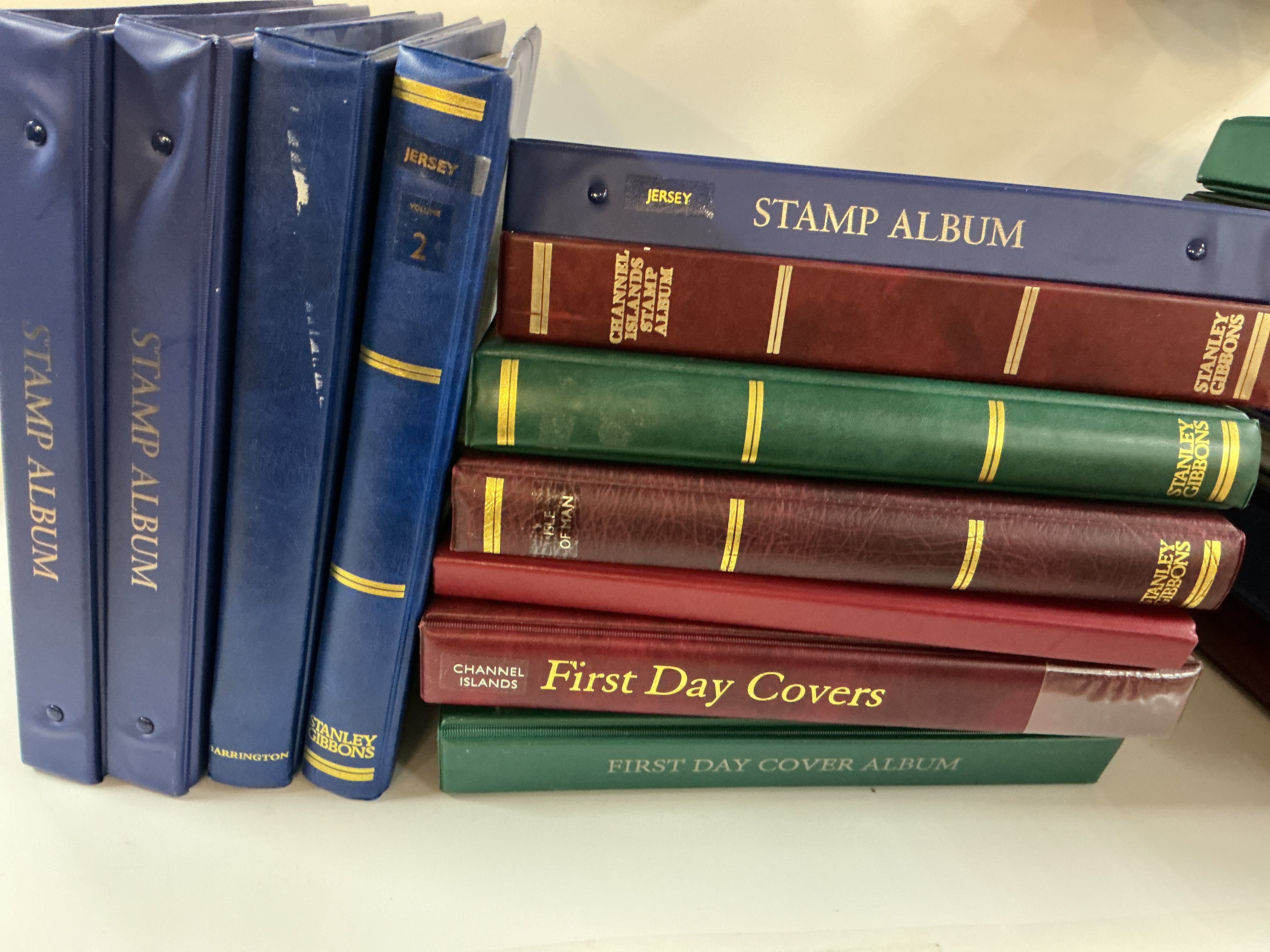 11 albums of Channel Islands postage stamps