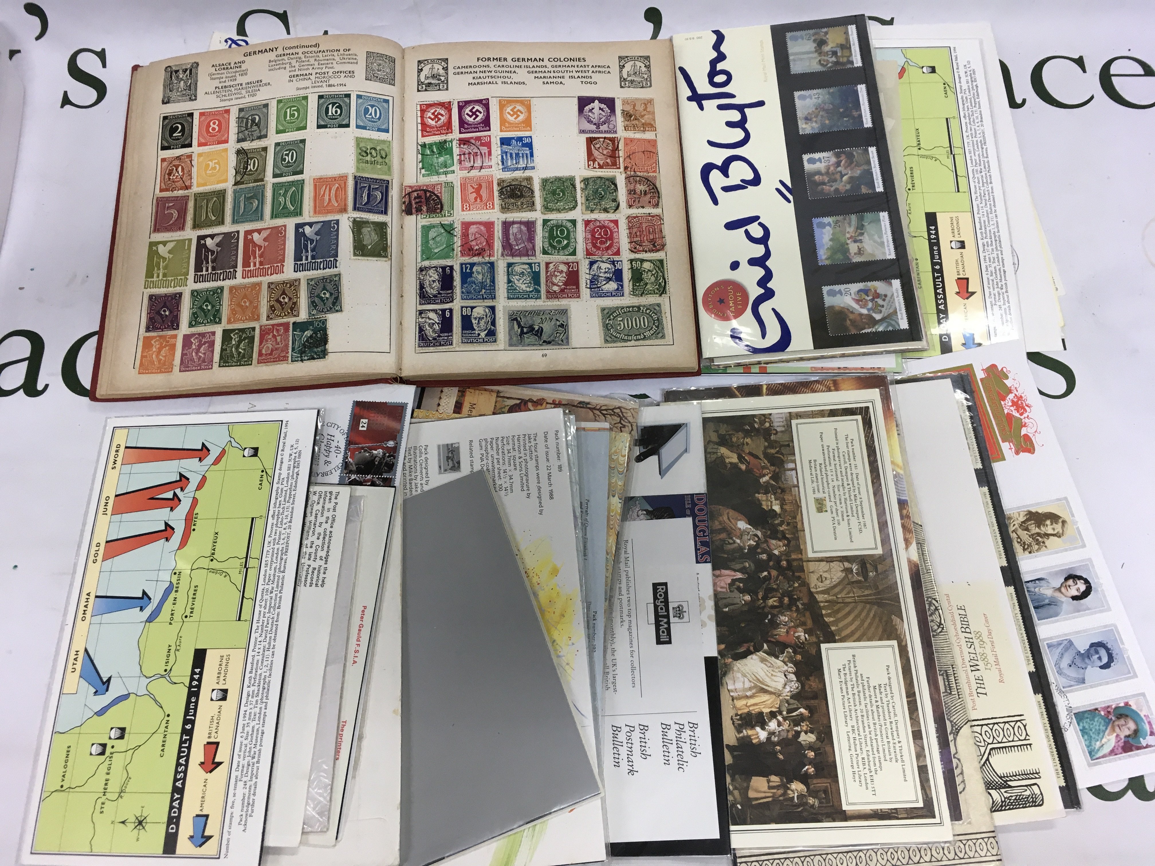 A box of mixed stamps and first day covers. Shipping category B.