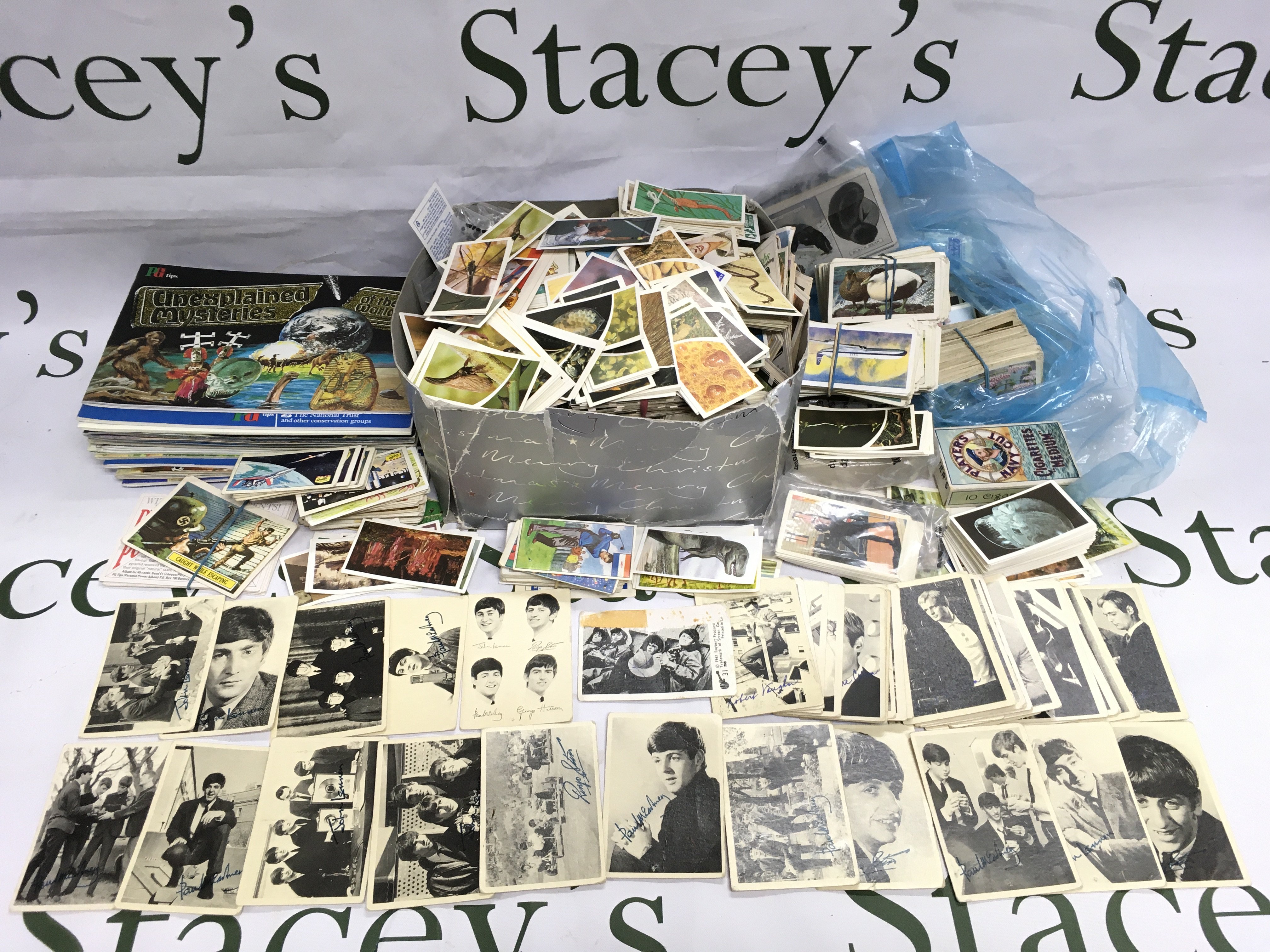 A collection of A+BC trading cards, cigarette cards and tea cards including The Beatles and The Man From UNKLE. Shipping category B.