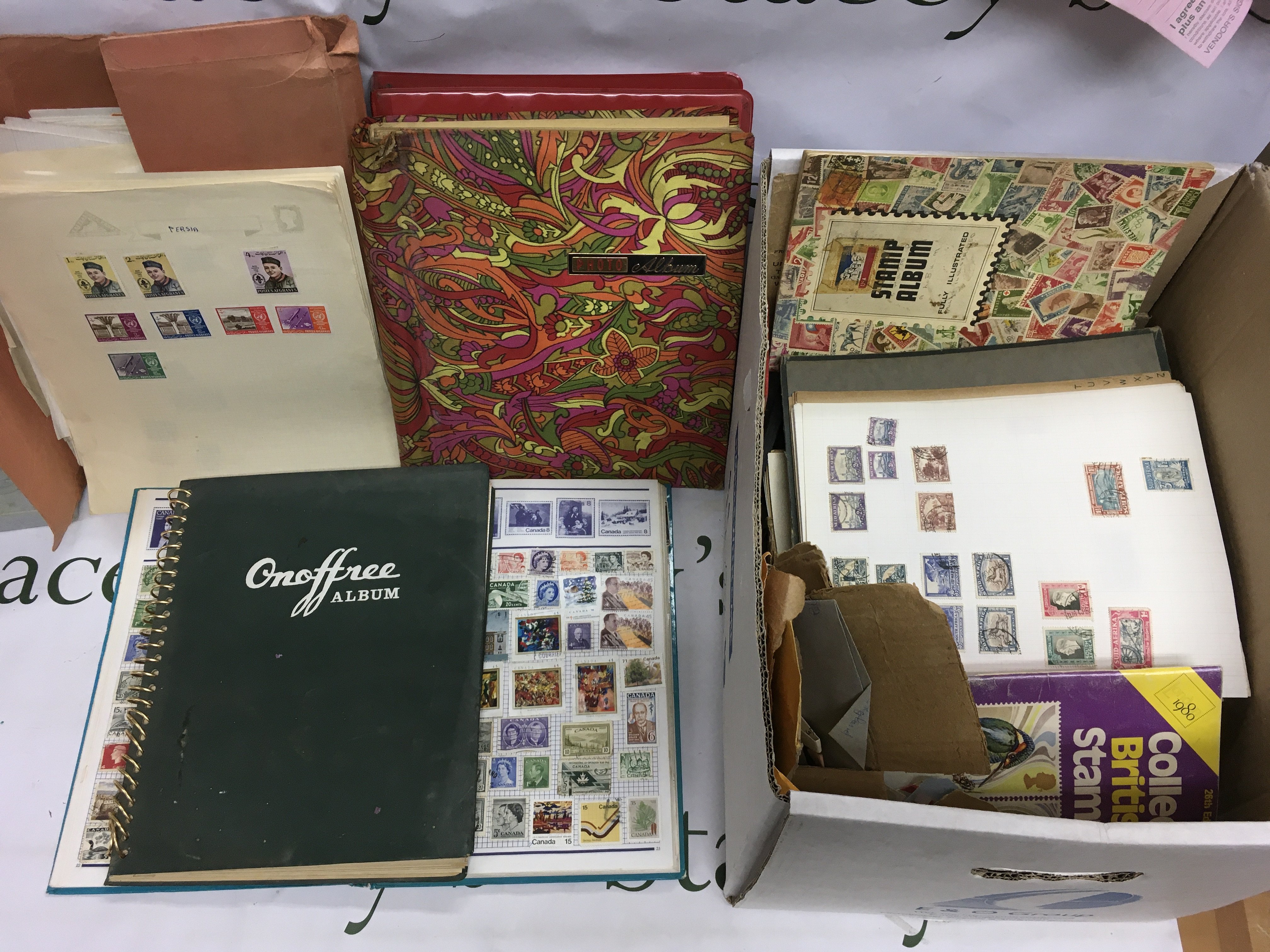 Three boxes of stamps and first day covers. Shipping category D.