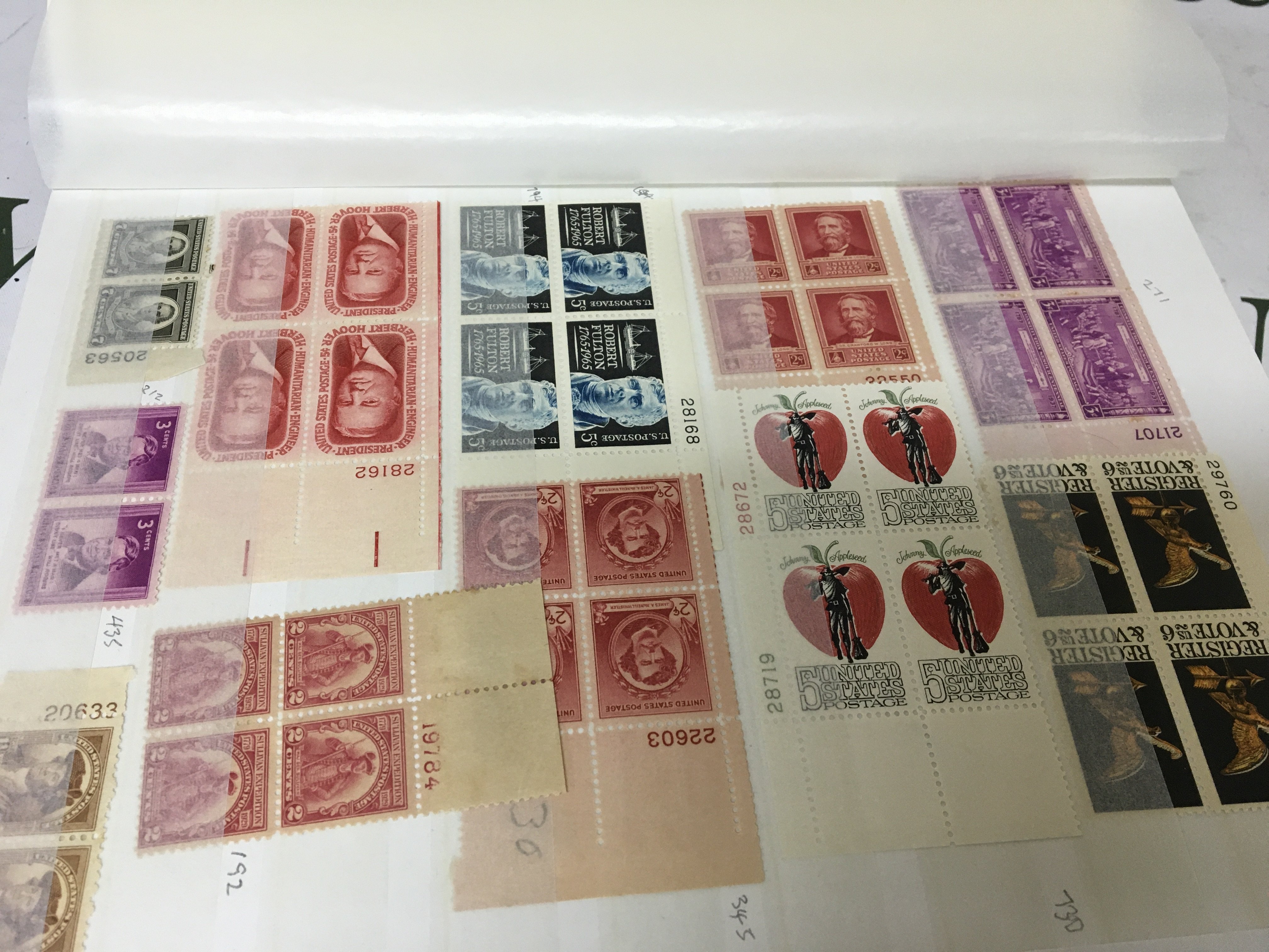 A well presented black album containing a comprehensive collection of American stamps in blocks of four unused many with outer edges.