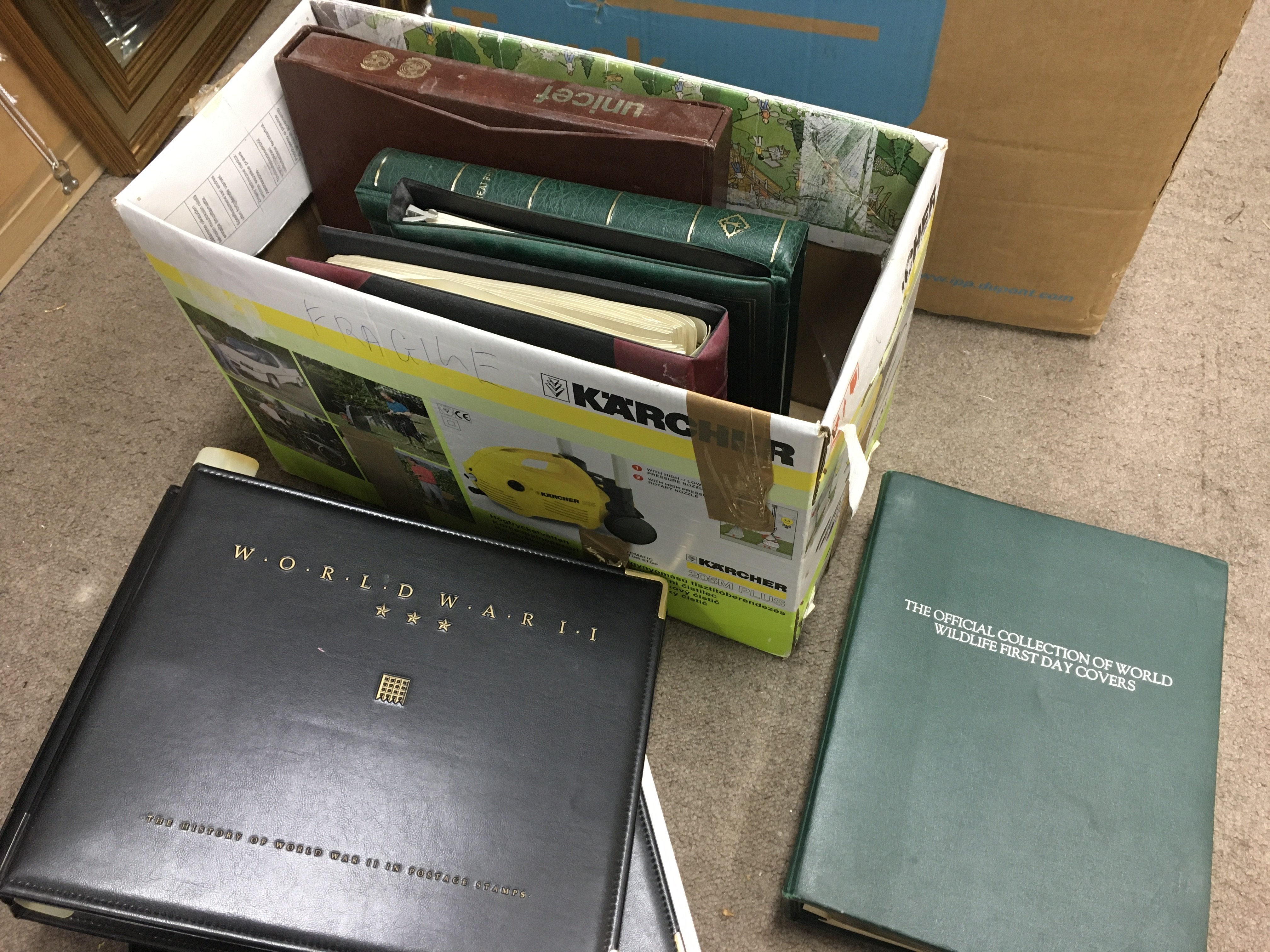 a collection of stamps and first day covers including history of WW2 albums