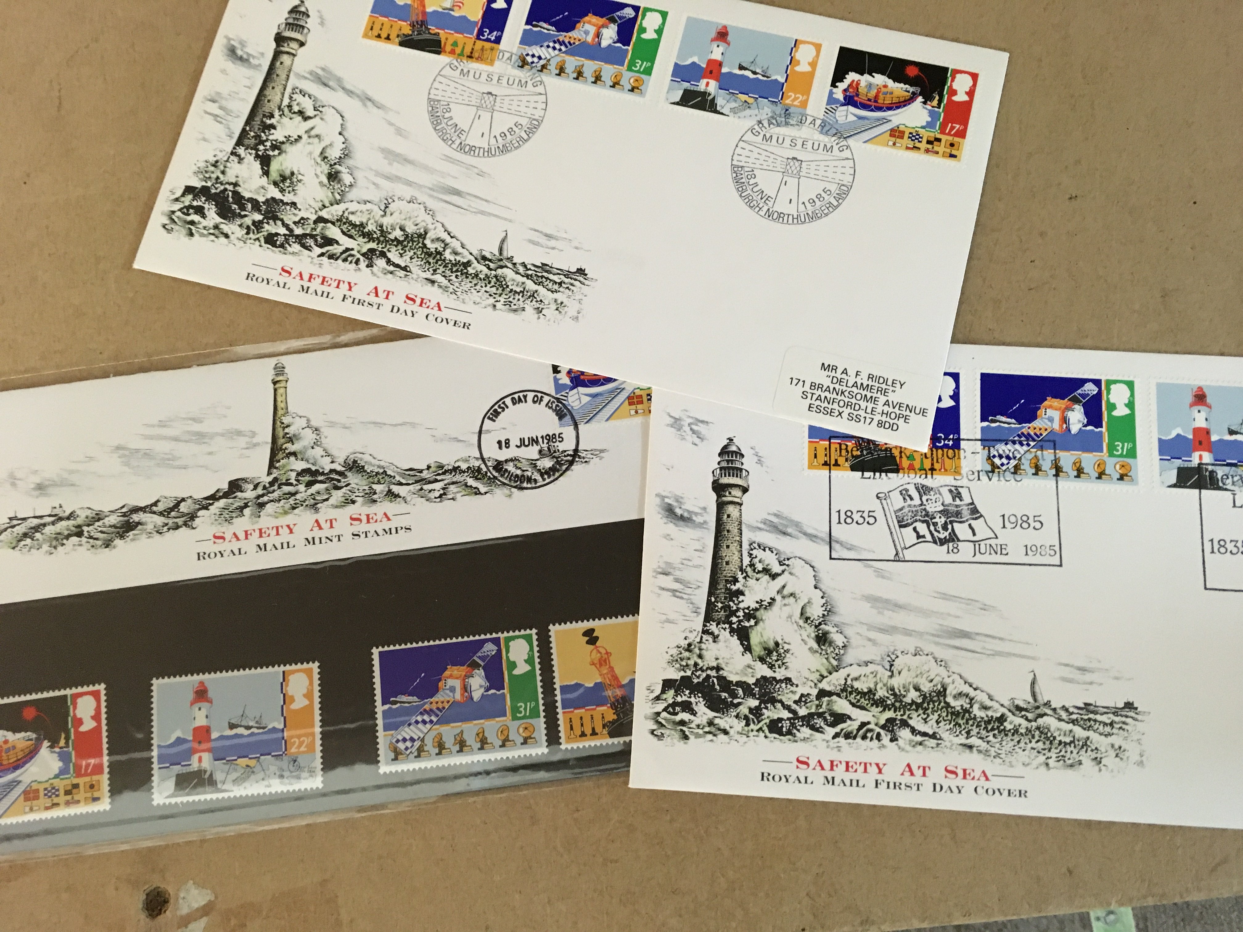 A box containing GB and world stamps . First day covers and Royal mail