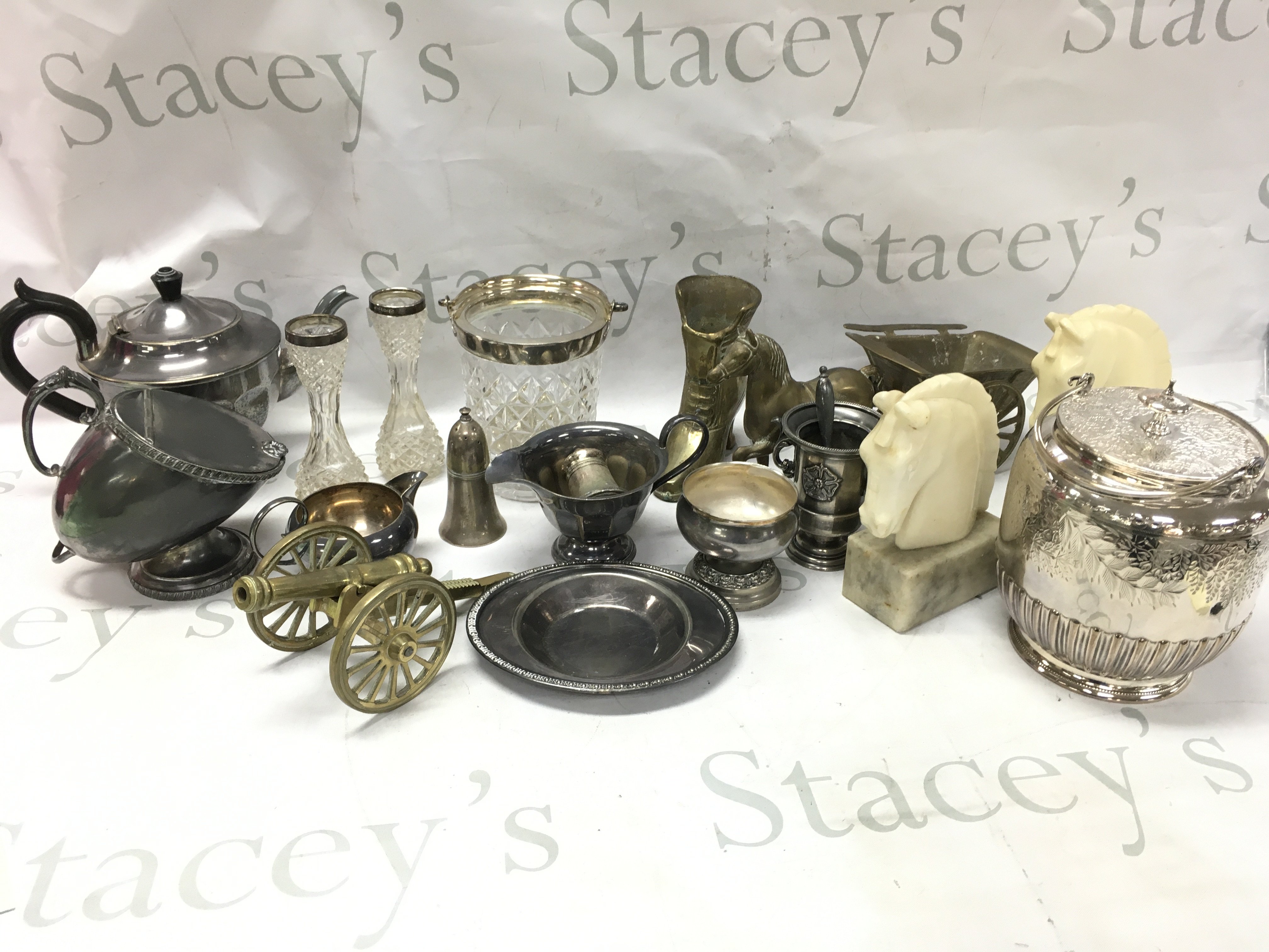 Silver plated items including a biscuit barrel, , brass shoe , cannon, horse and cart ,silver hallmarked collar small cut glass vases . This lot cannot be posted