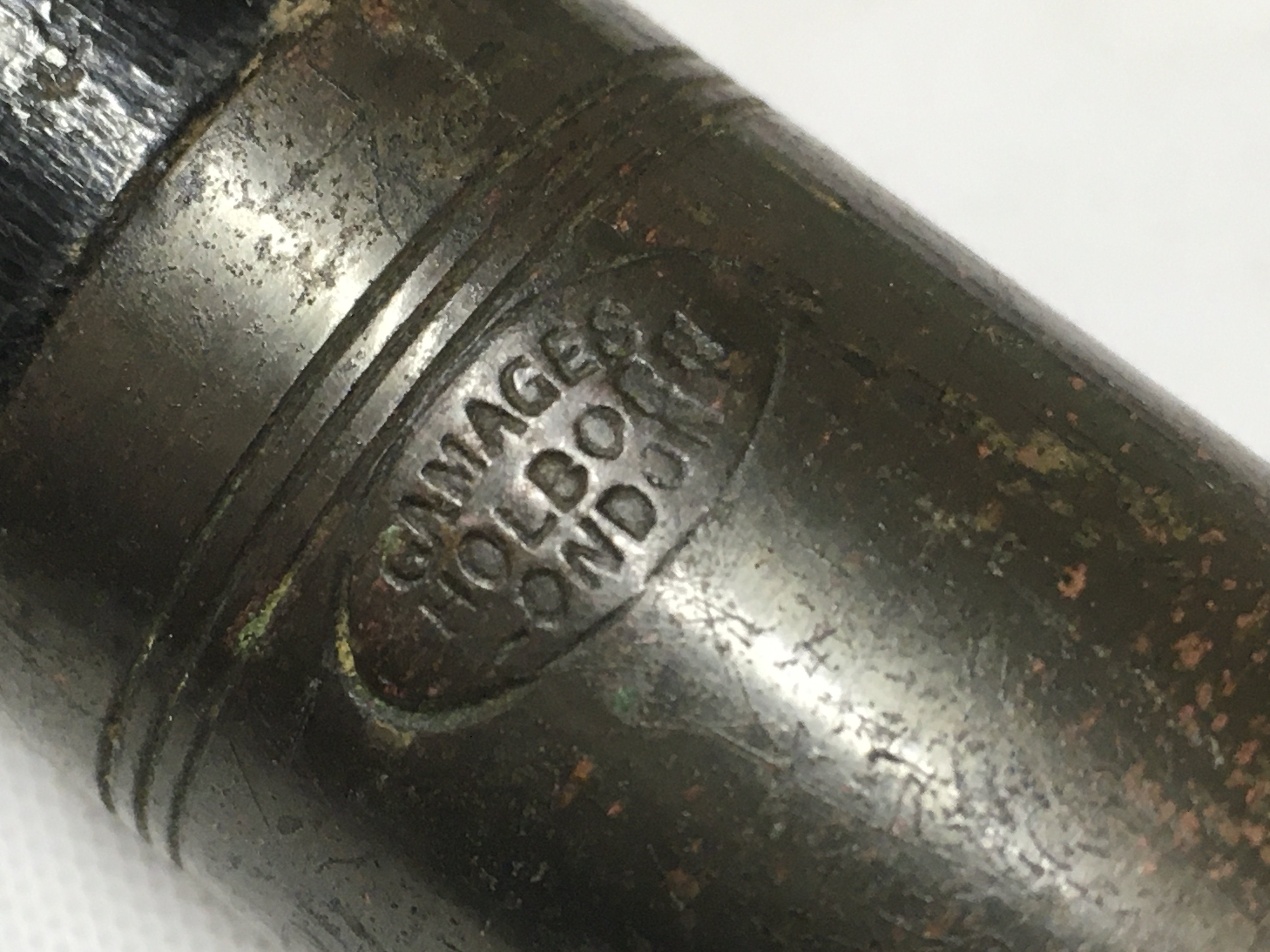 A Victorian Gamages fishing rod and another unmarked antique rod.this lot cannot be posted. NO RESERVE