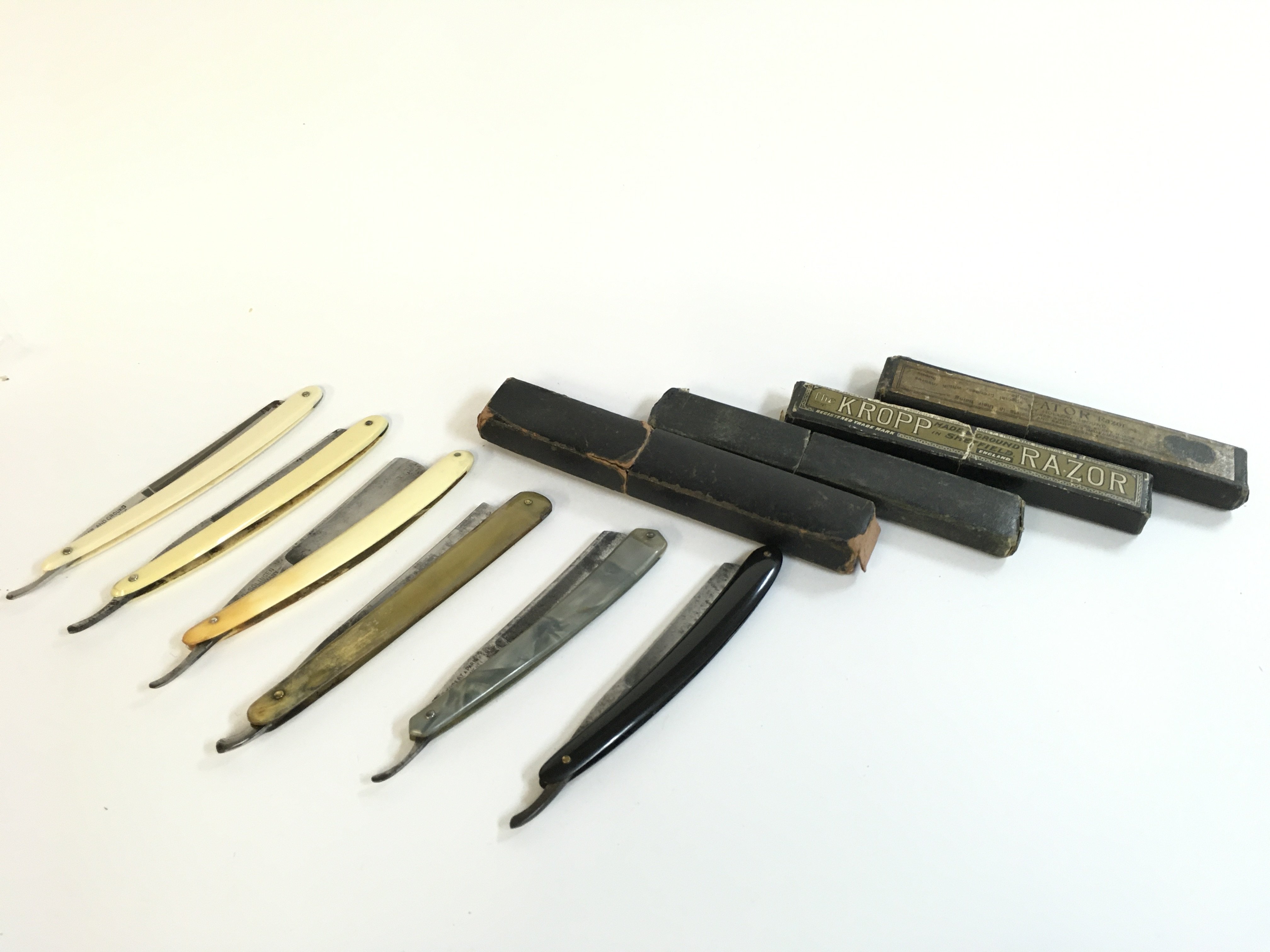 Six vintage straight razors , this lot cannot be posted