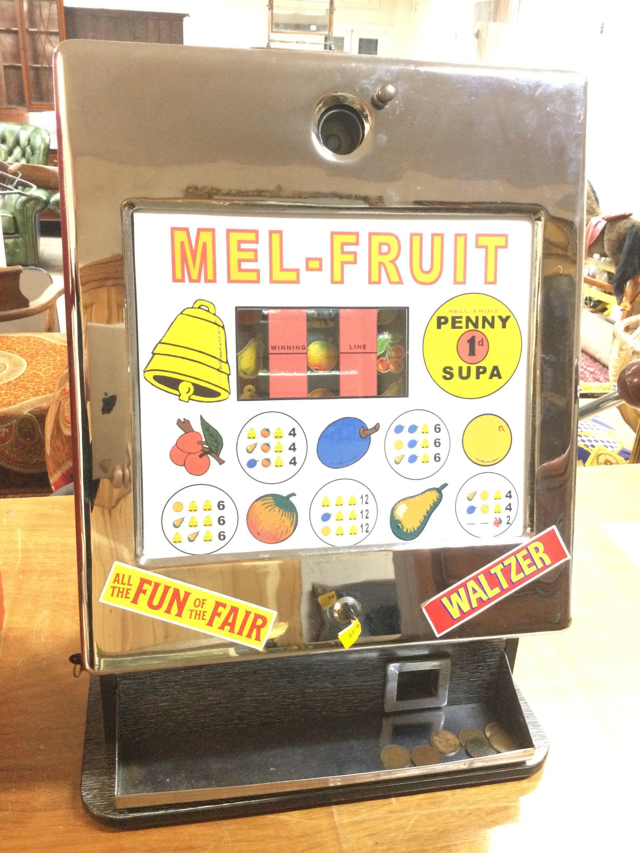 A Vintage Mel-Fruit One Arm Bandit made By Melroy Automatics. Approx Height 67Cm.