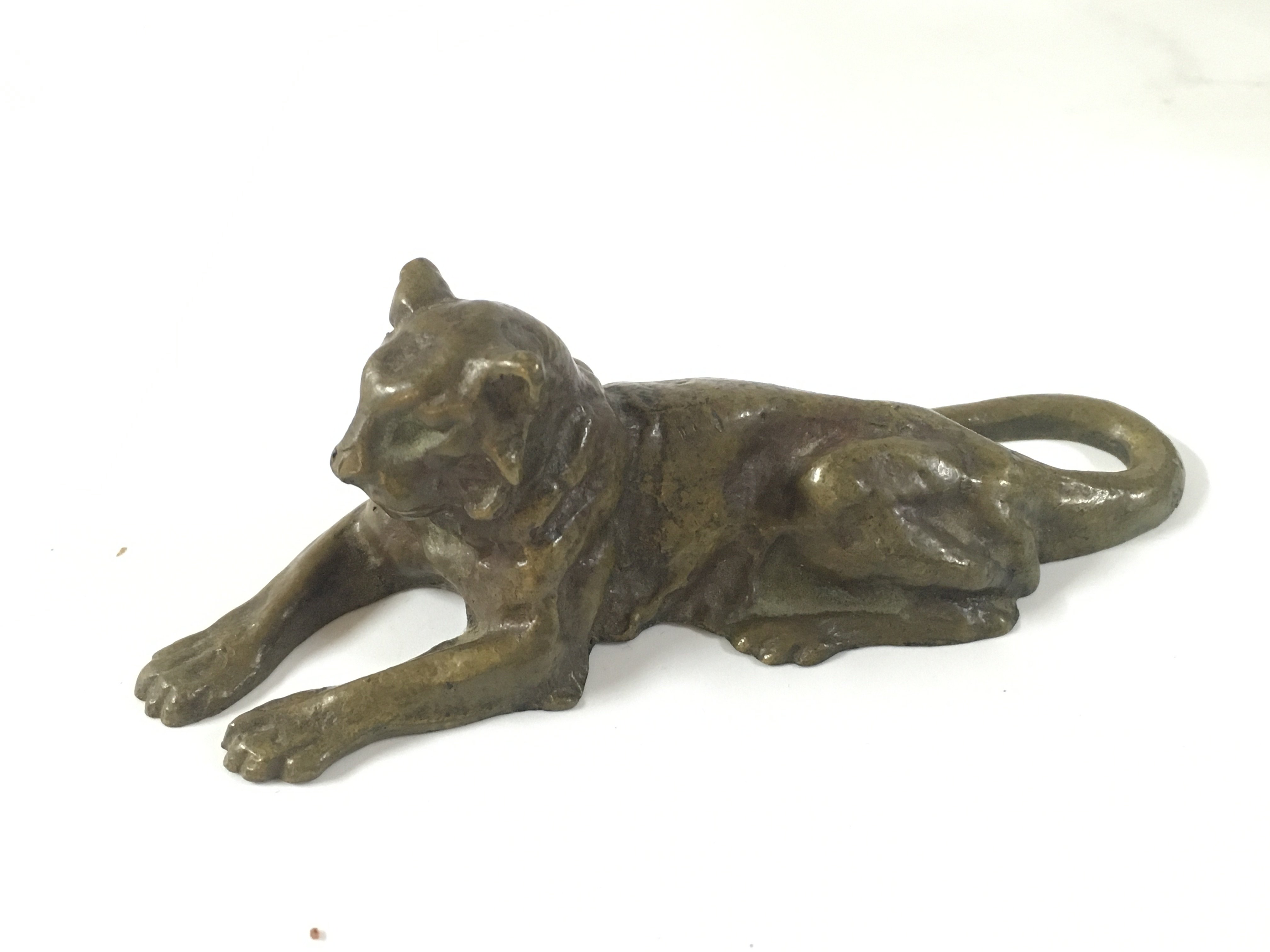 A vintage bronze Tiffany studios lion paper weight.