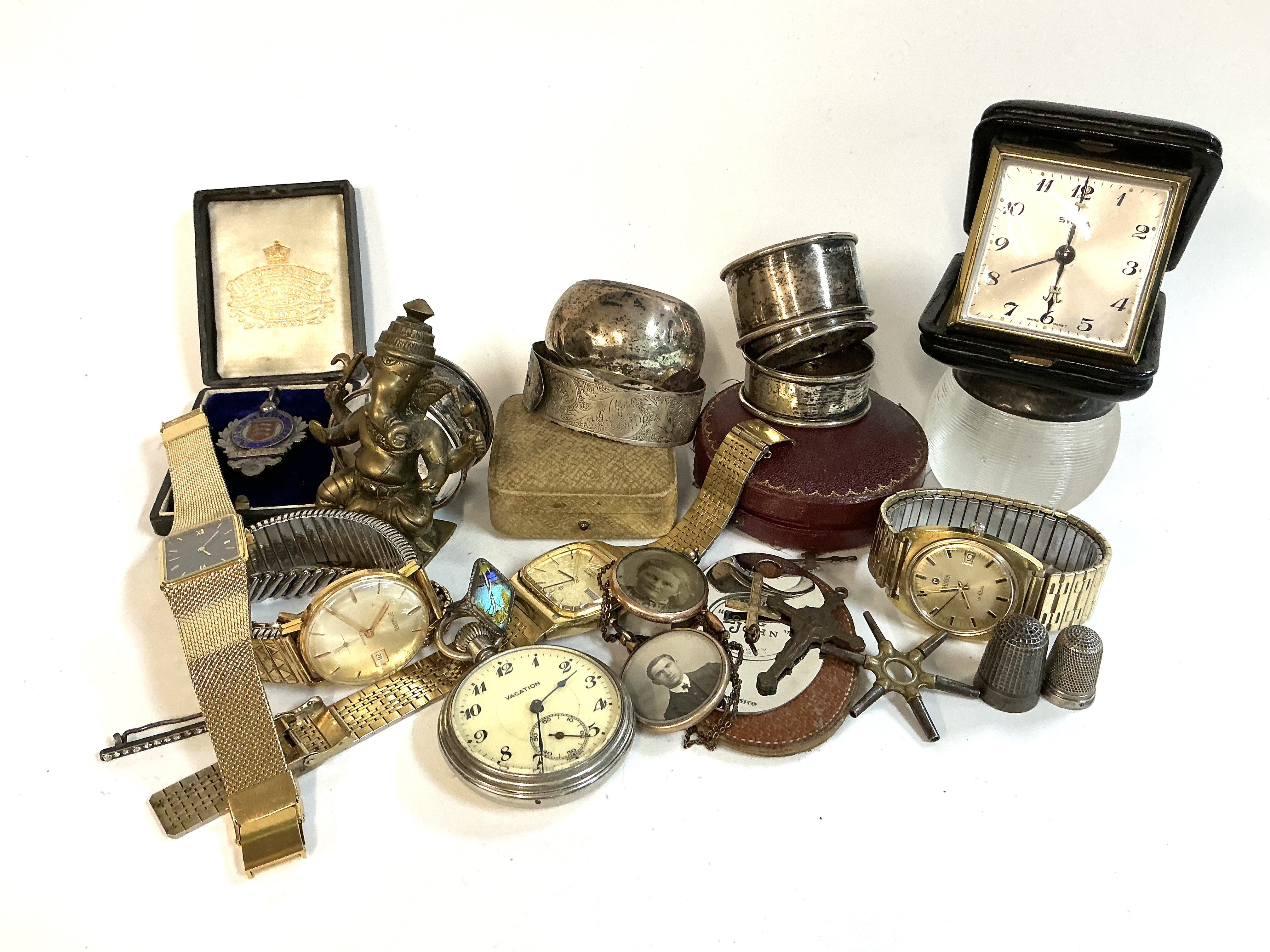 A mixed lot of small items including silver.