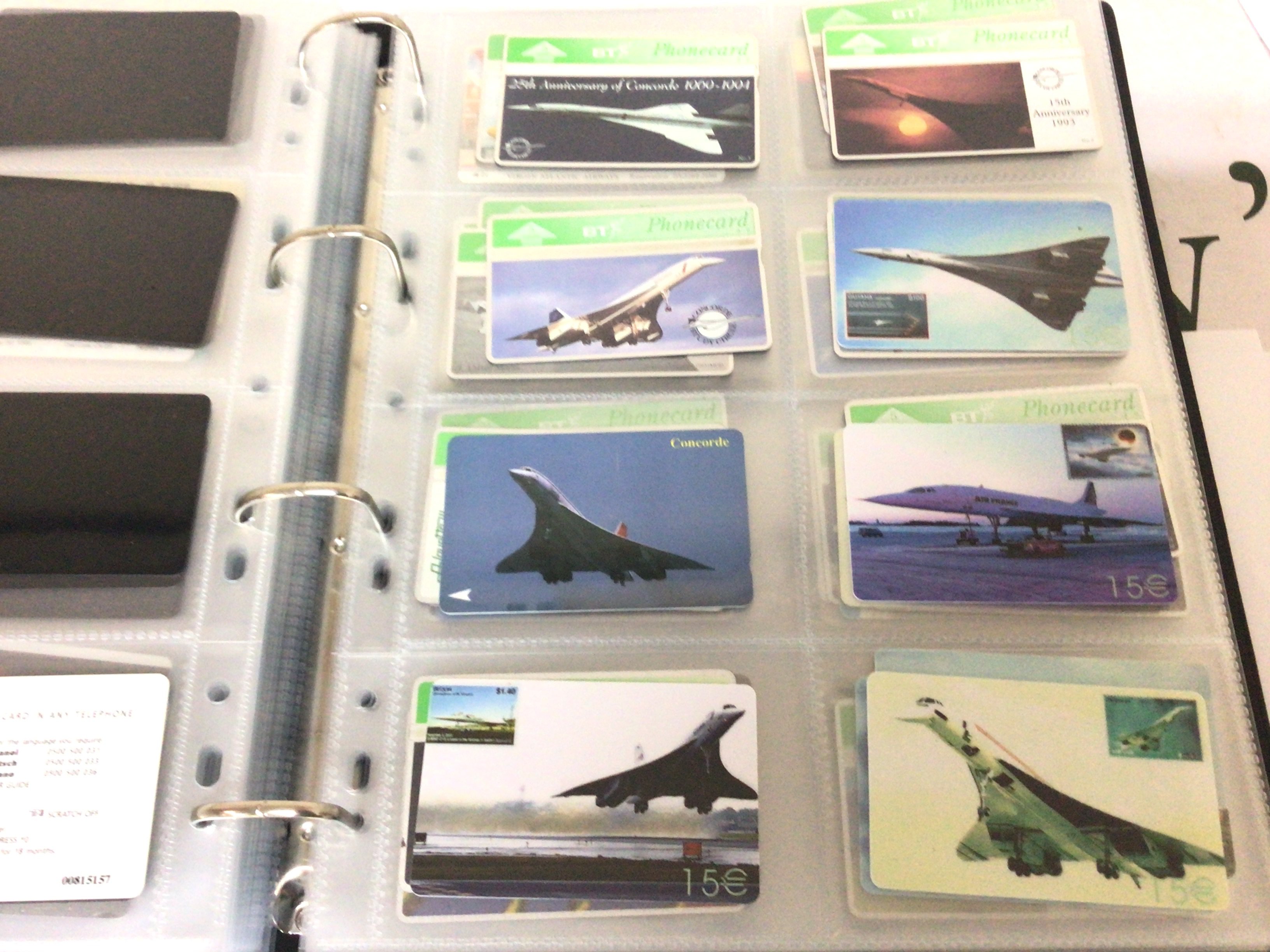 An Album containing an Extensive collection of well presented pictorial phone cards including Chinese phone cards British Phone cards.