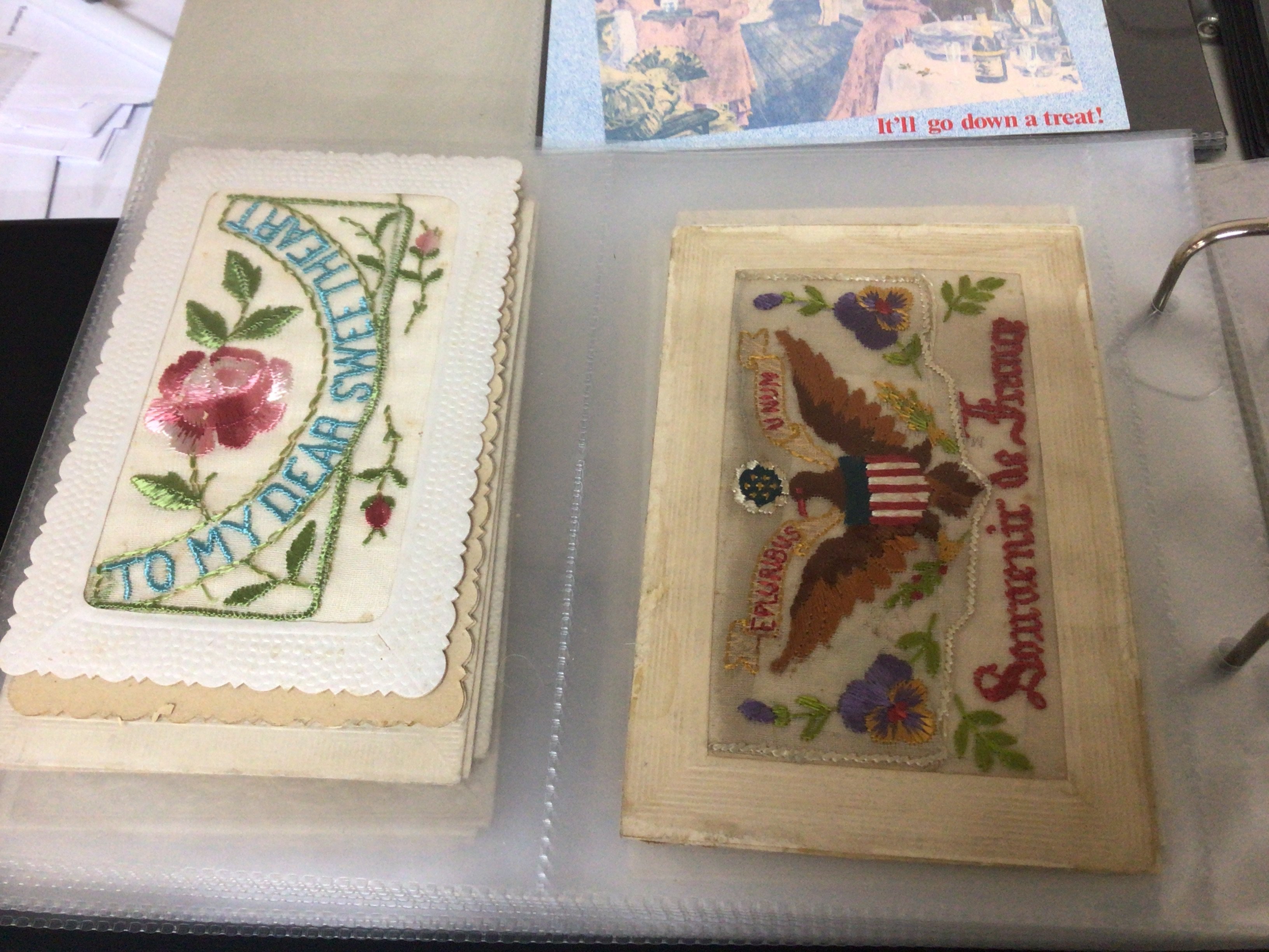 Three Albums containing a good collection of mixed postcards including a collection of I world war embroidered cards. Vintage Comical cards other late Victorian and early 20th century cards and 20th century political comical cards (3)